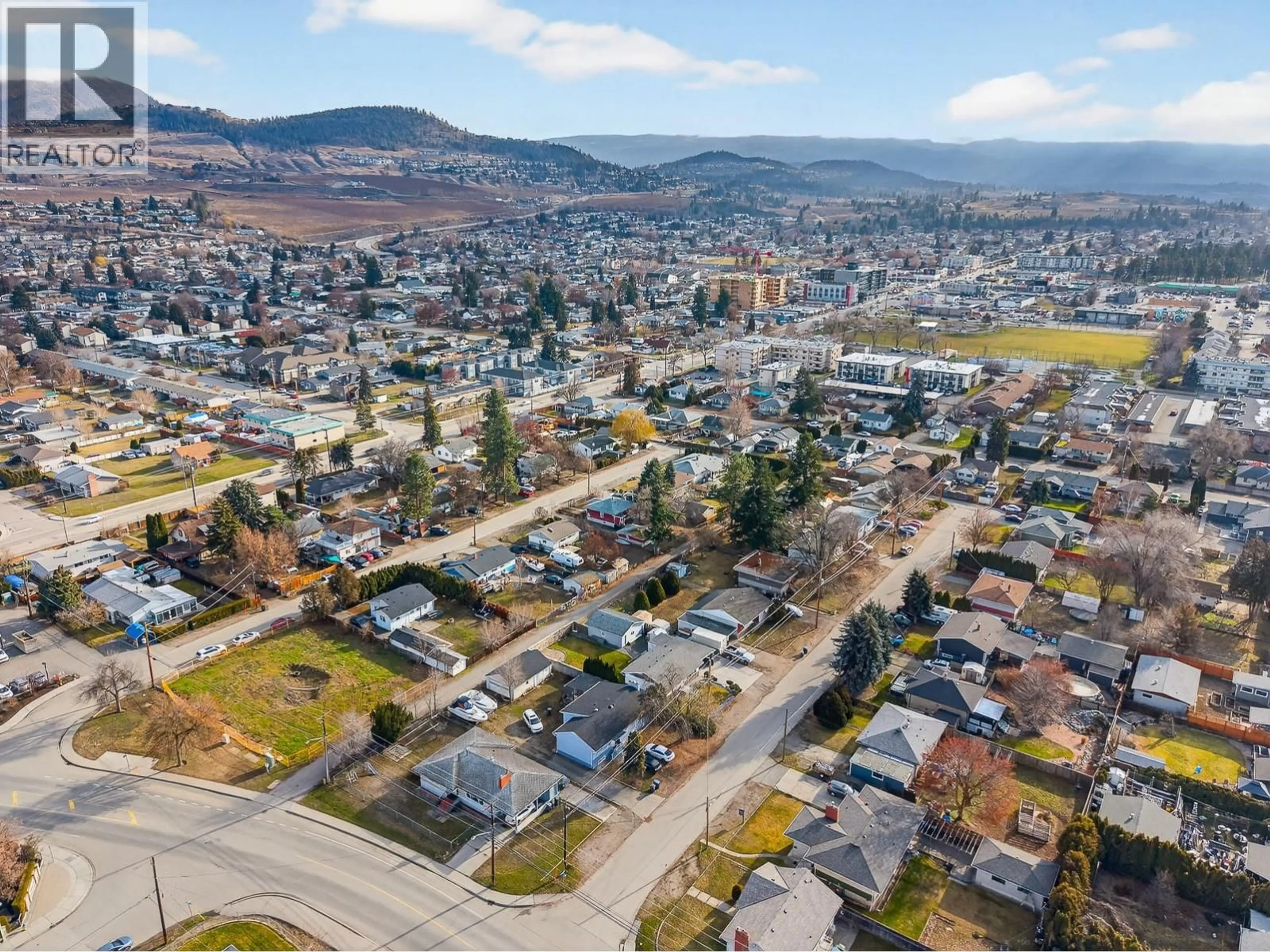 A pic from outside/outdoor area/front of a property/back of a property/a pic from drone, street for 505 DONHAUSER ROAD, Kelowna British Columbia V1X3G2