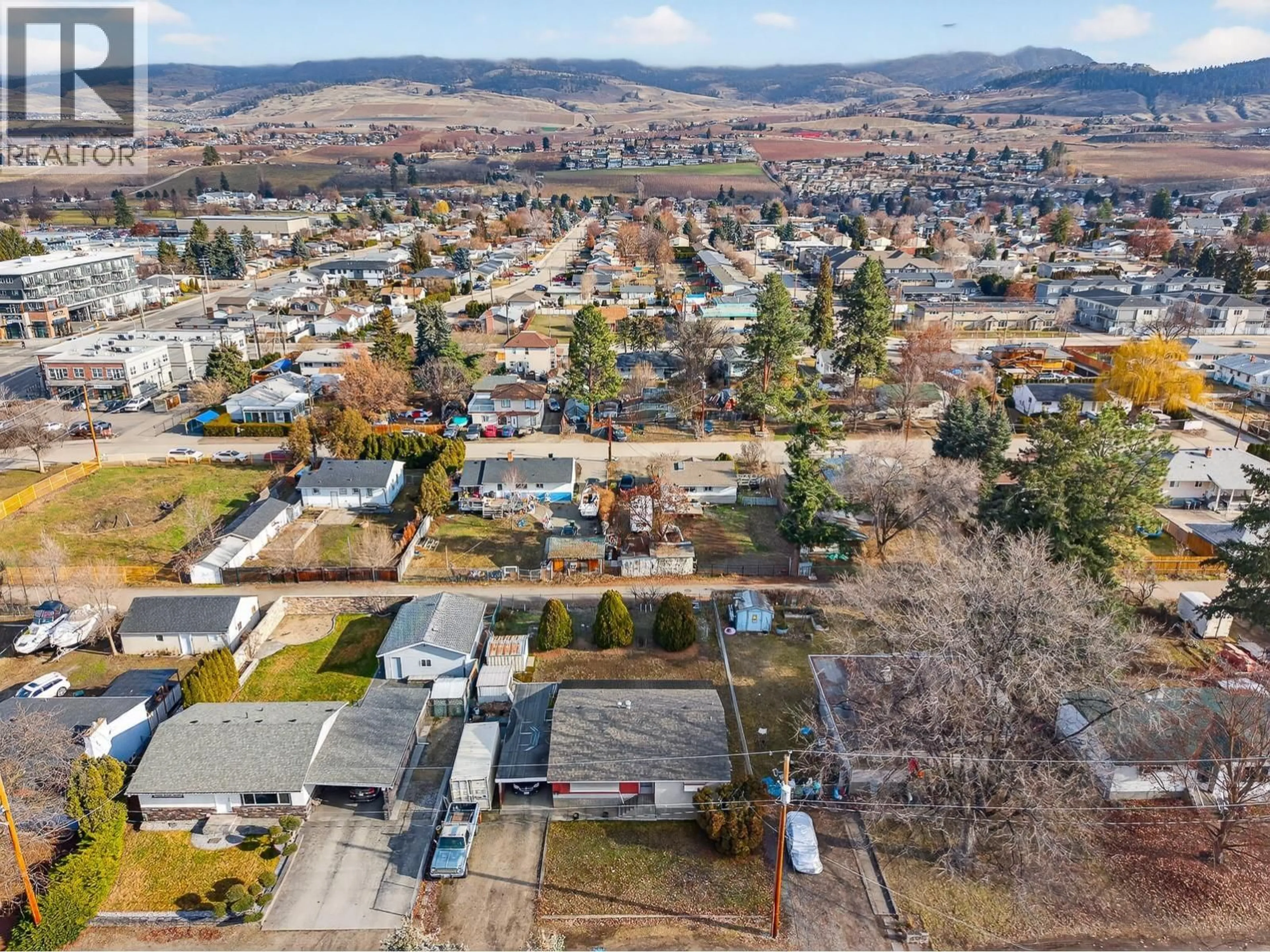A pic from outside/outdoor area/front of a property/back of a property/a pic from drone, mountain view for 505 DONHAUSER ROAD, Kelowna British Columbia V1X3G2