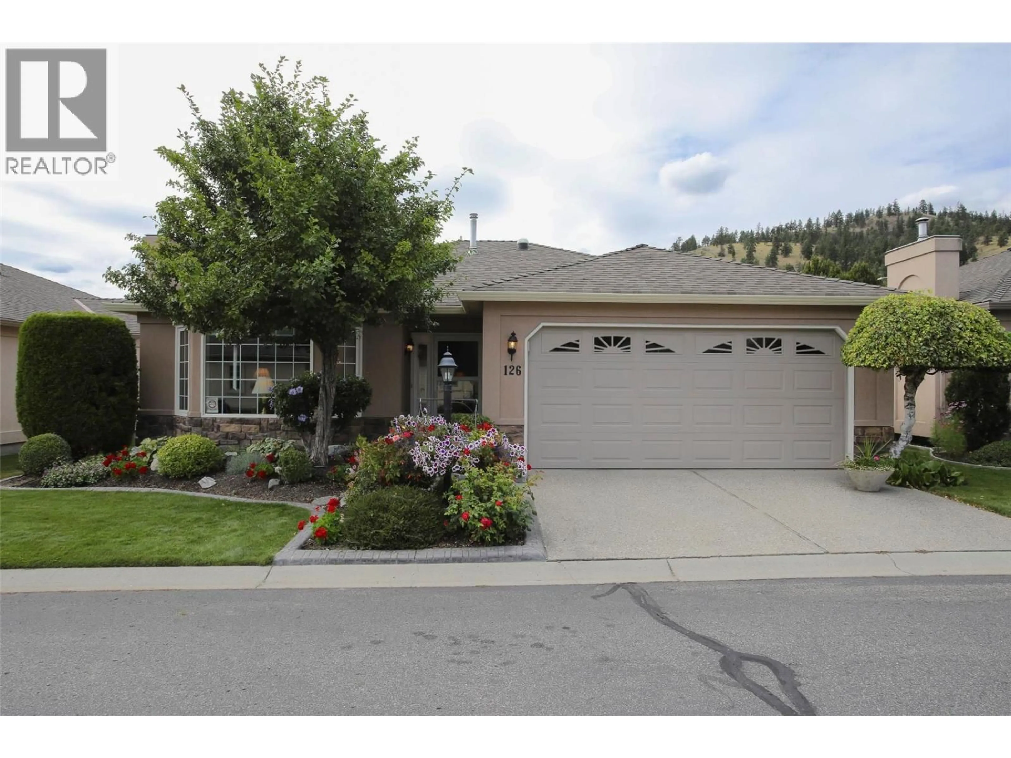 Home with vinyl exterior material, street for 126 - 595 YATES ROAD, Kelowna British Columbia V1V1P8