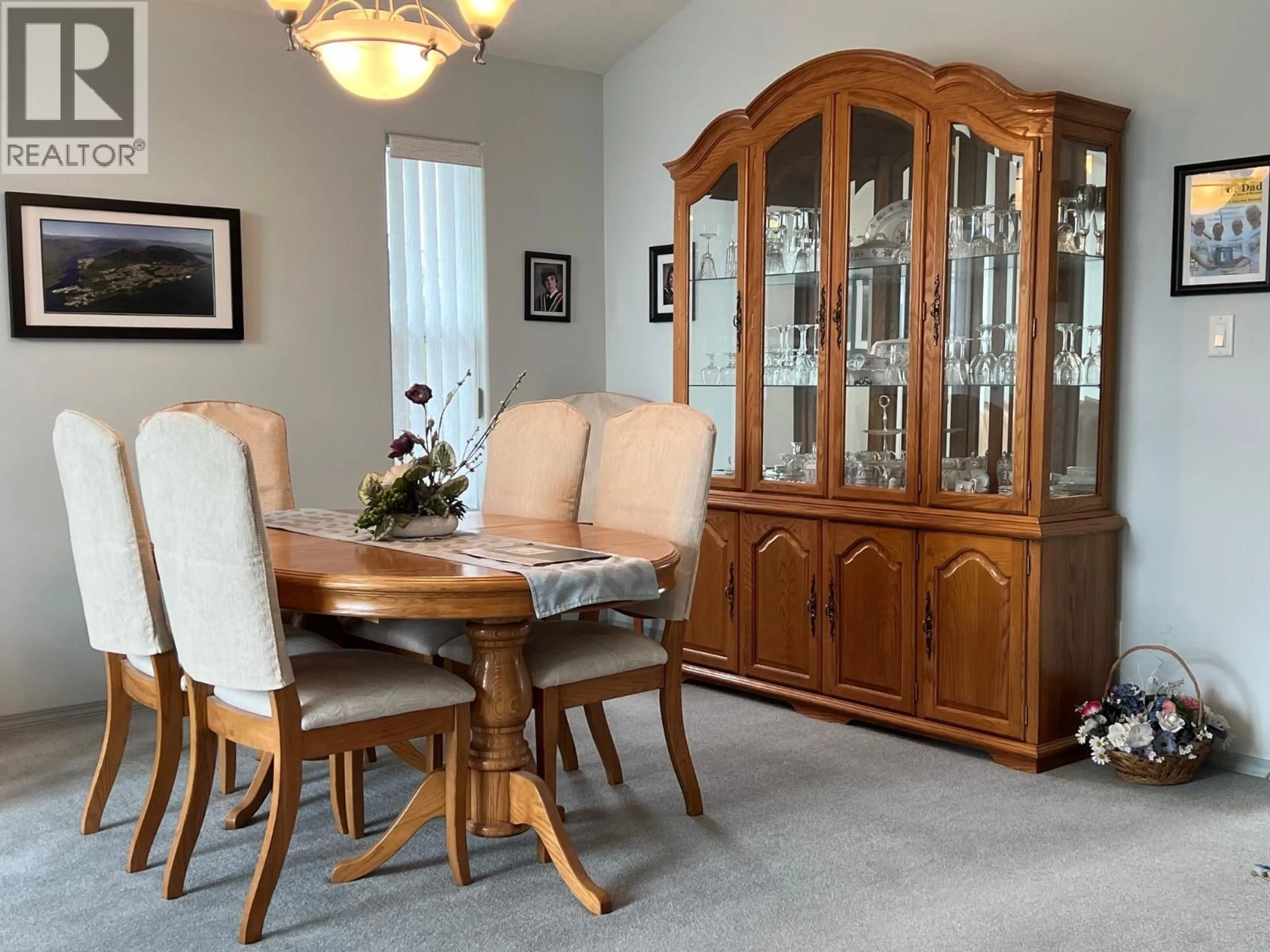 Dining room, wood/laminate floor for 328 3RD STREET, Vernon British Columbia V1H1Z1