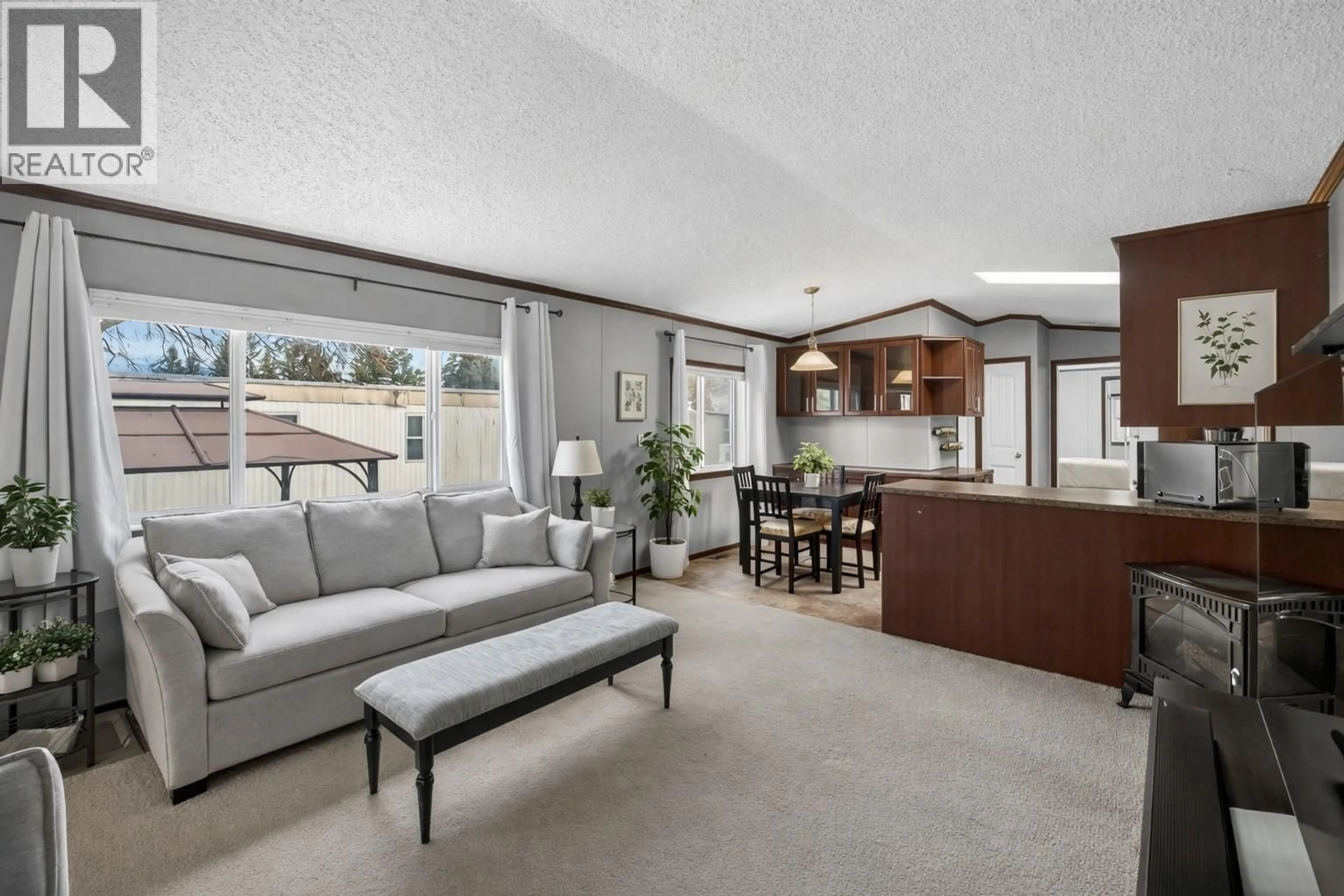 Living room with furniture, unknown for 39 - 3350 10 AVENUE NORTHEAST, Salmon Arm British Columbia V1E1J6