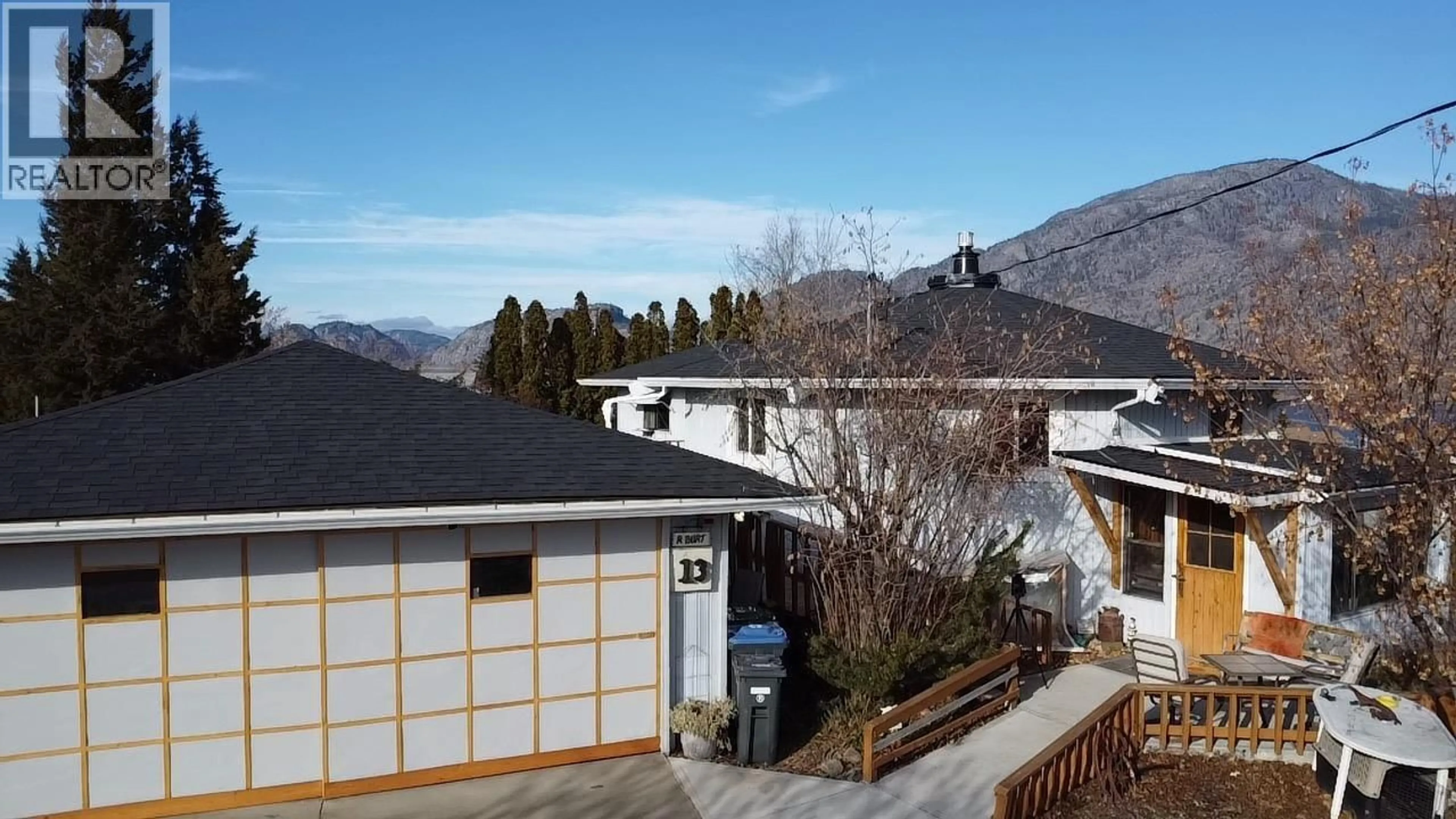 A pic from outside/outdoor area/front of a property/back of a property/a pic from drone, mountain view for 13 MCINTOSH COURT, Osoyoos British Columbia V0H1V2