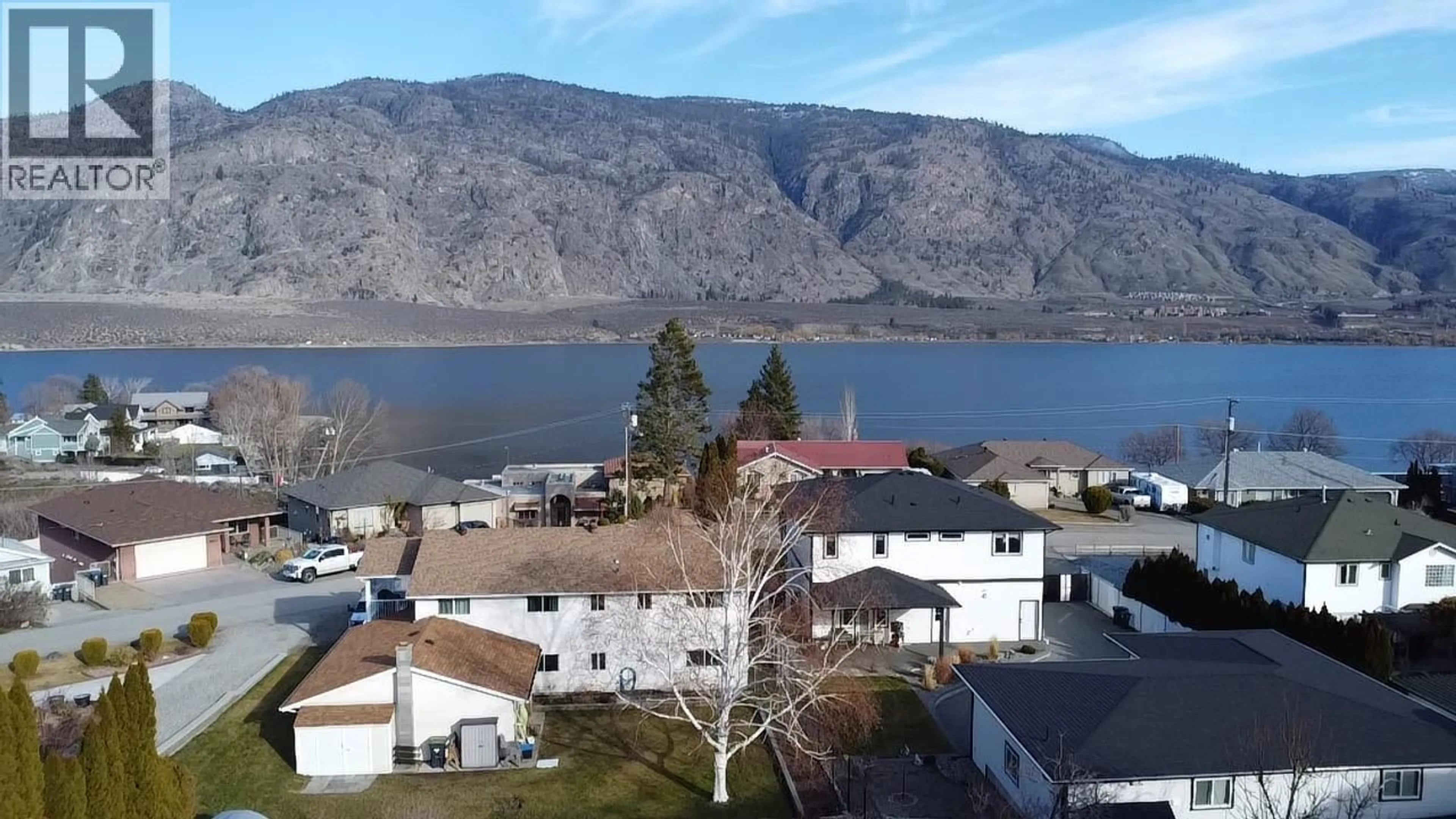 A pic from outside/outdoor area/front of a property/back of a property/a pic from drone, water/lake/river/ocean view for 13 MCINTOSH COURT, Osoyoos British Columbia V0H1V2