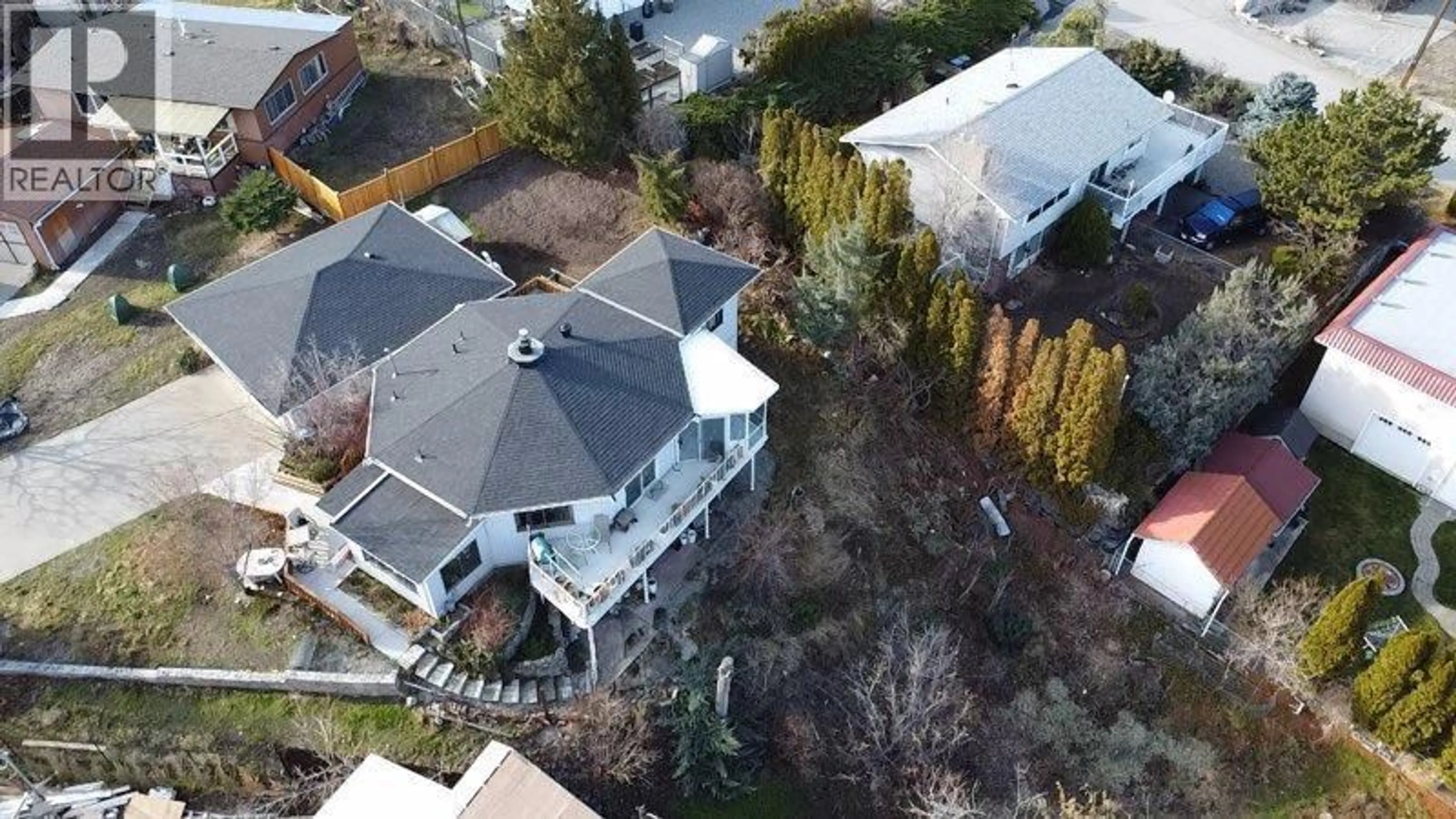 A pic from outside/outdoor area/front of a property/back of a property/a pic from drone, street for 13 MCINTOSH COURT, Osoyoos British Columbia V0H1V2