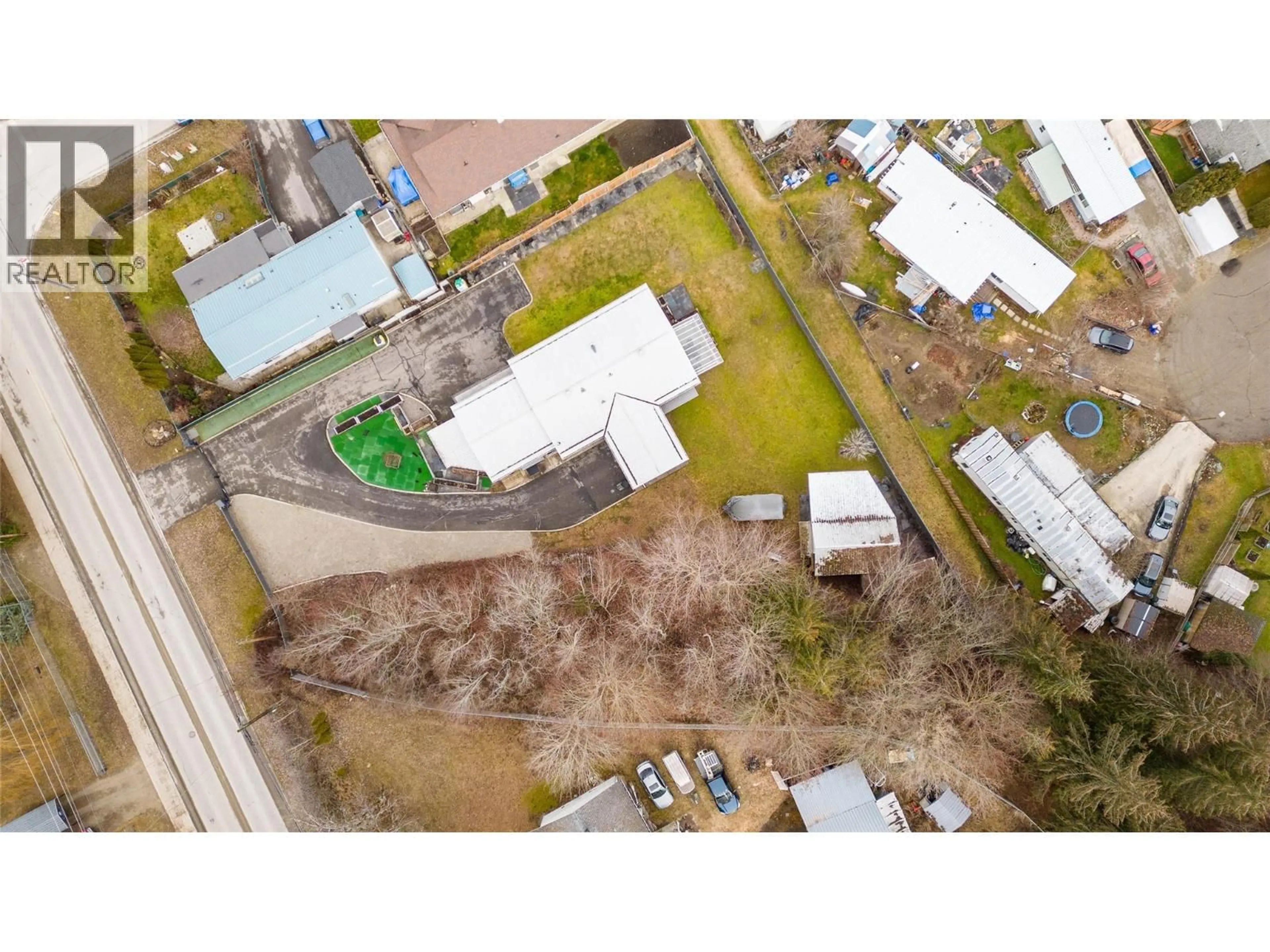A pic from outside/outdoor area/front of a property/back of a property/a pic from drone, street for 6960 50 STREET NORTHEAST, Salmon Arm British Columbia V0E1K0