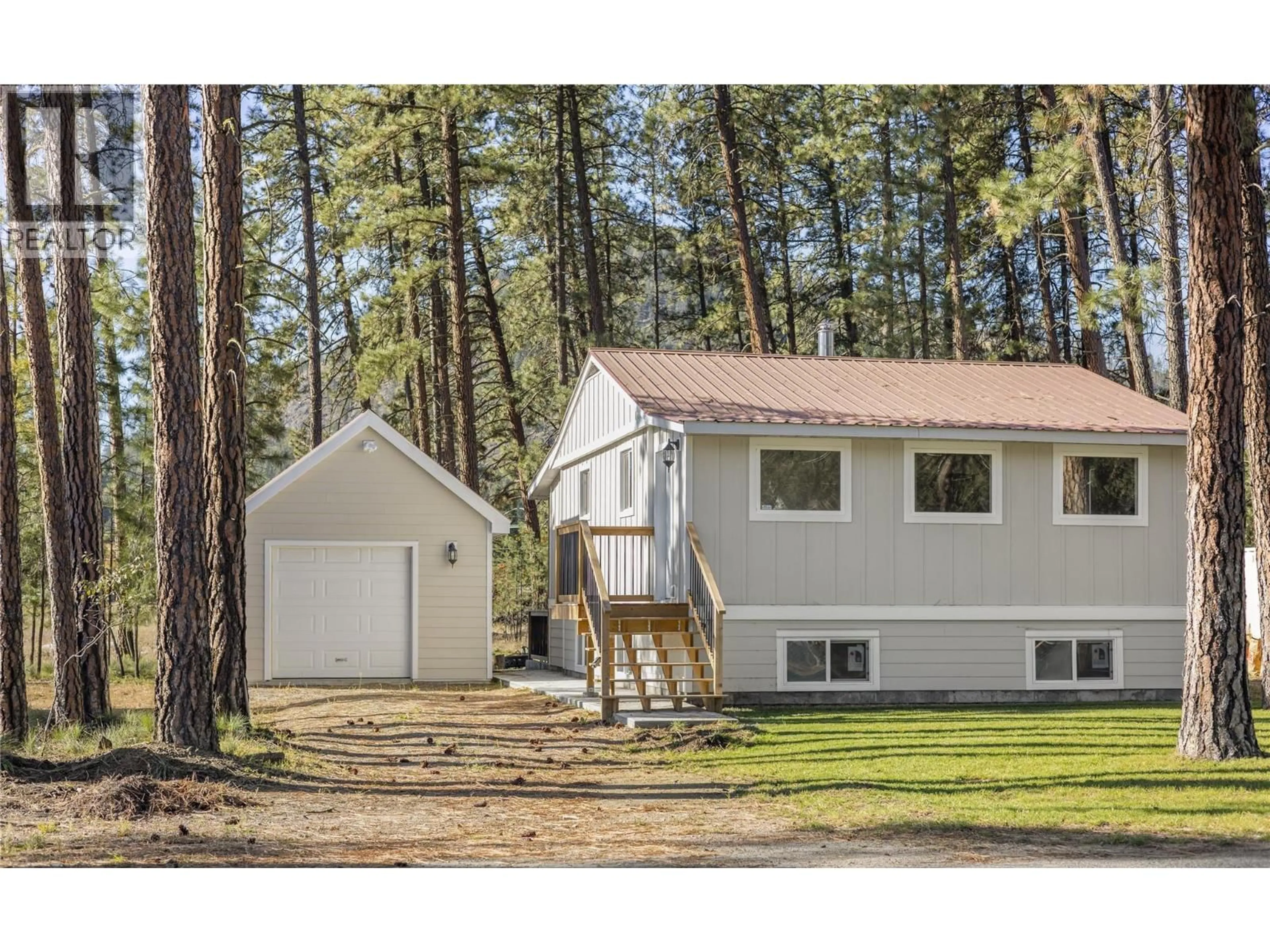 Home with vinyl exterior material, forest/trees view for 8127 DONALDSON DRIVE, Grand Forks British Columbia V0H1H2