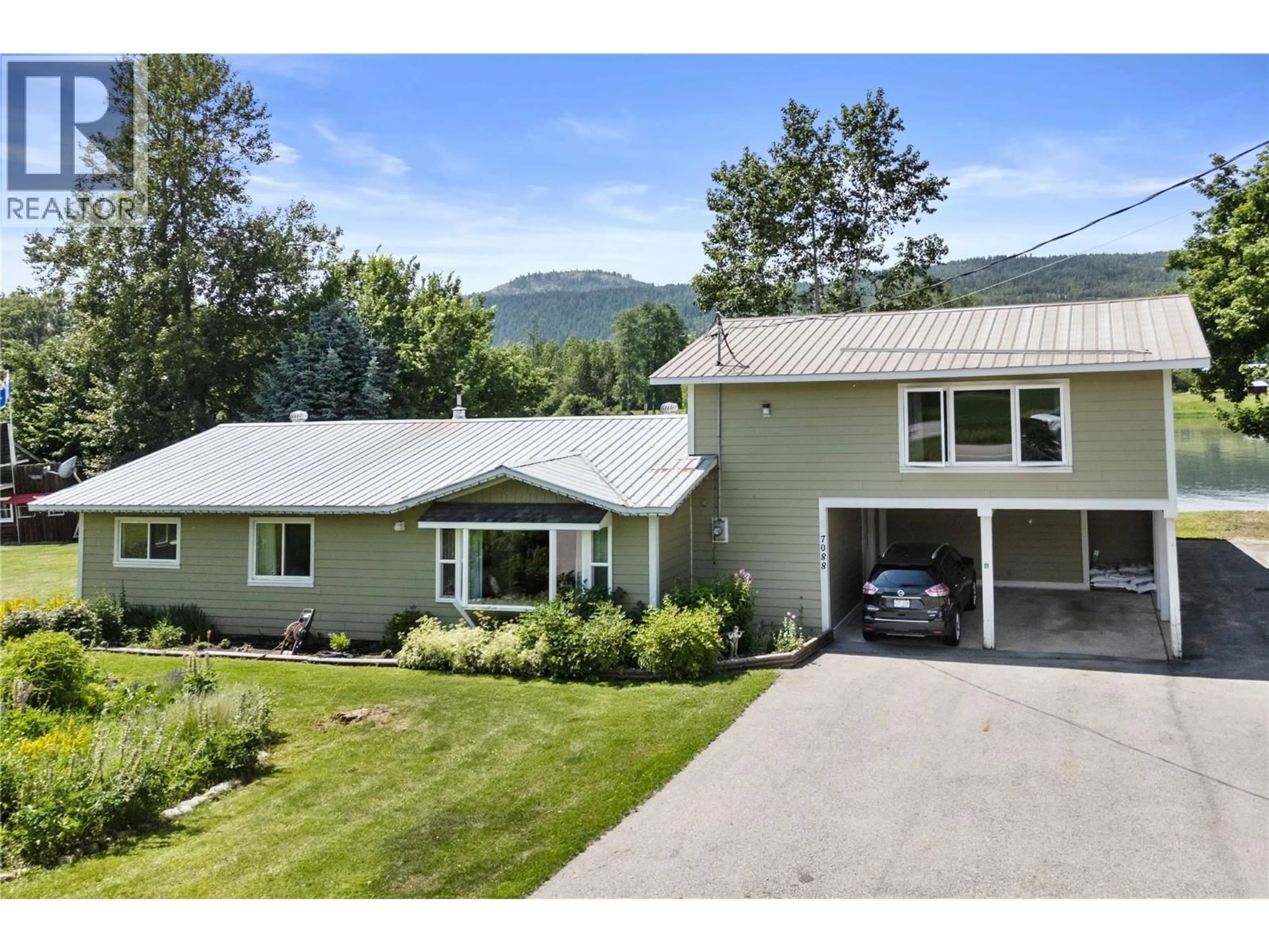 A pic from outside/outdoor area/front of a property/back of a property/a pic from drone, mountain view for 7088 97A HIGHWAY, Grindrod British Columbia V0E1Y0