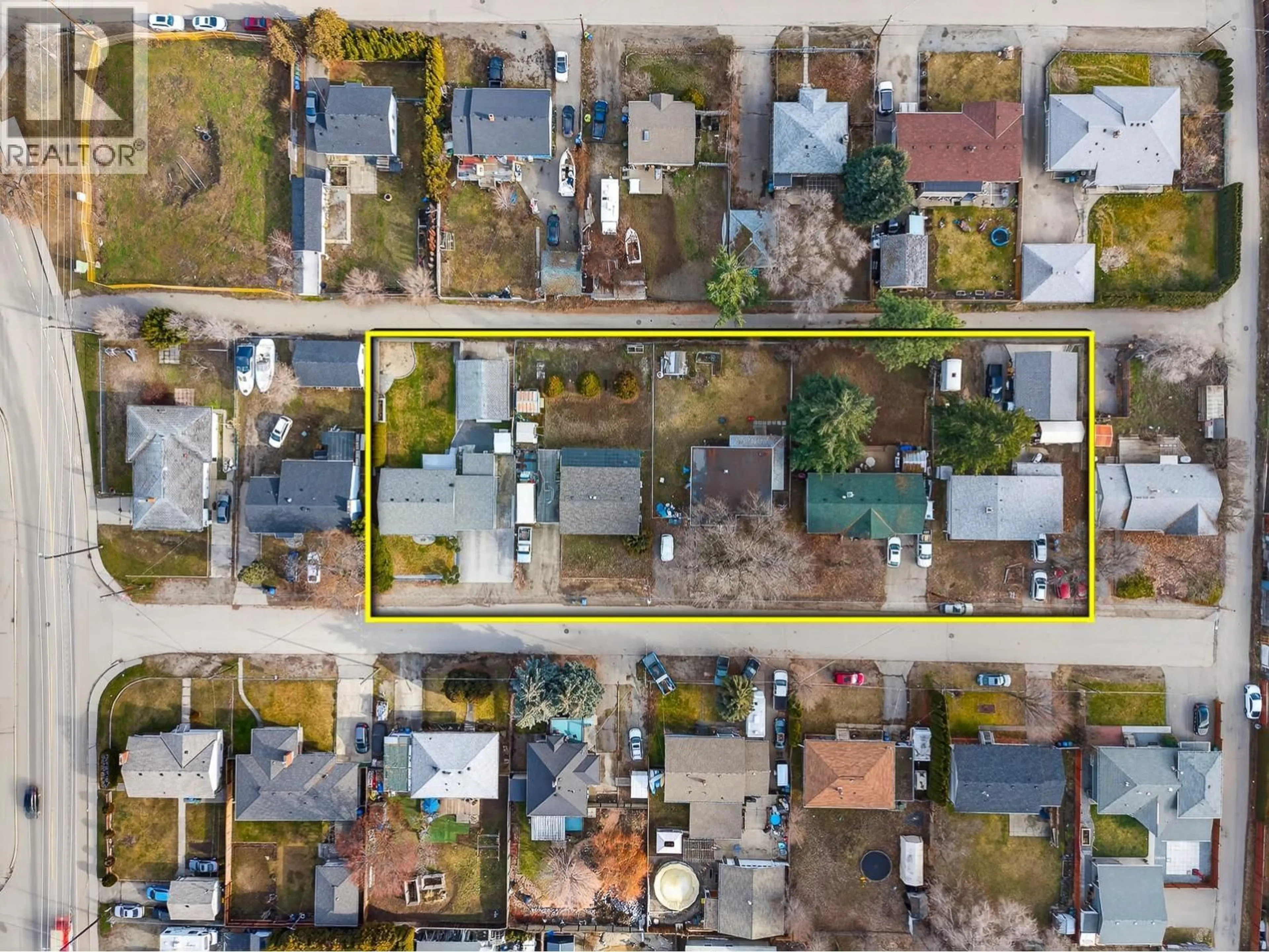 A pic from outside/outdoor area/front of a property/back of a property/a pic from drone, street for 465 DONHAUSER ROAD, Kelowna British Columbia V1X3G2