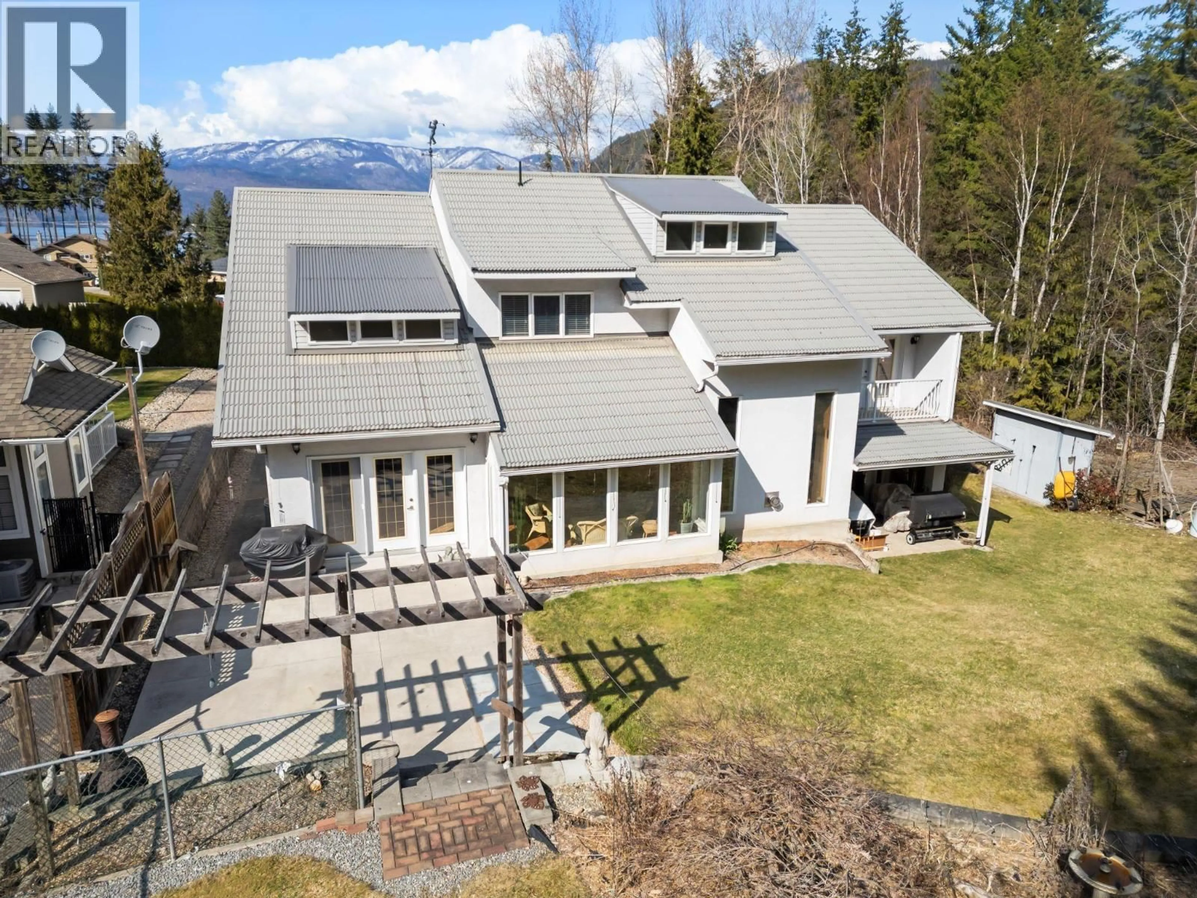 A pic from outside/outdoor area/front of a property/back of a property/a pic from drone, mountain view for 2572 BAYVIEW ROAD, Blind Bay British Columbia V0E1H1
