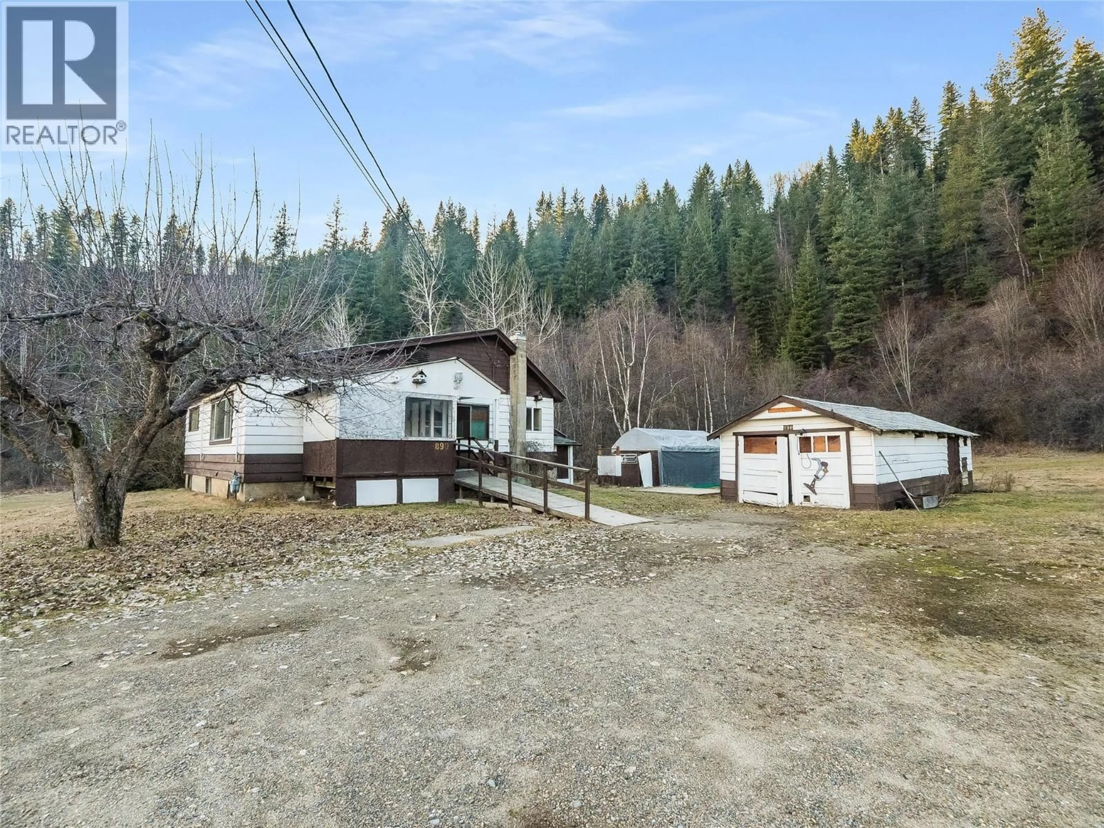 A pic from outside/outdoor area/front of a property/back of a property/a pic from drone, unknown for 890 CHINA CREEK ROAD, Genelle British Columbia V0G1G0