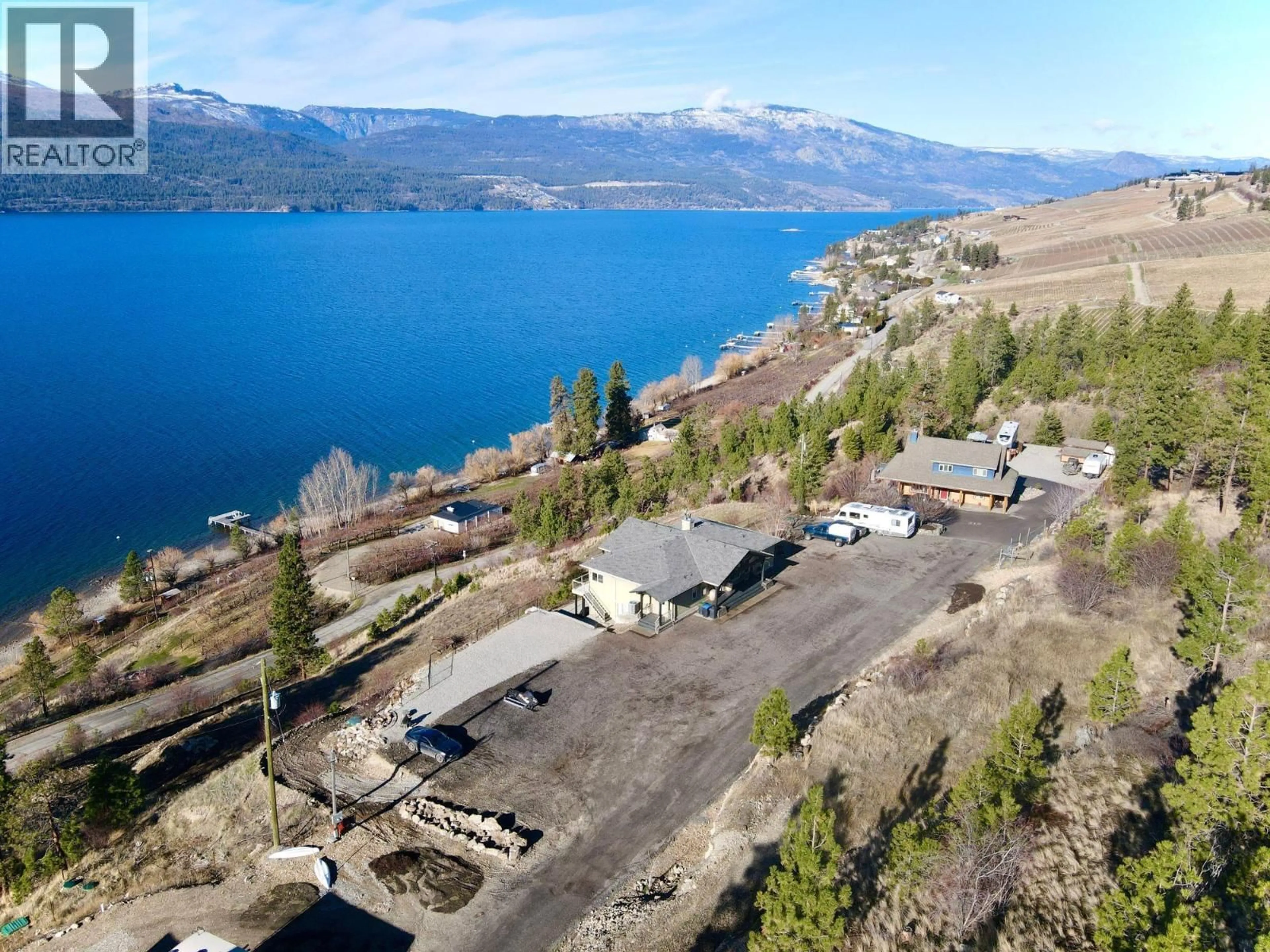A pic from outside/outdoor area/front of a property/back of a property/a pic from drone, water/lake/river/ocean view for 13938 MOBERLY ROAD, Lake Country British Columbia V4V1A6