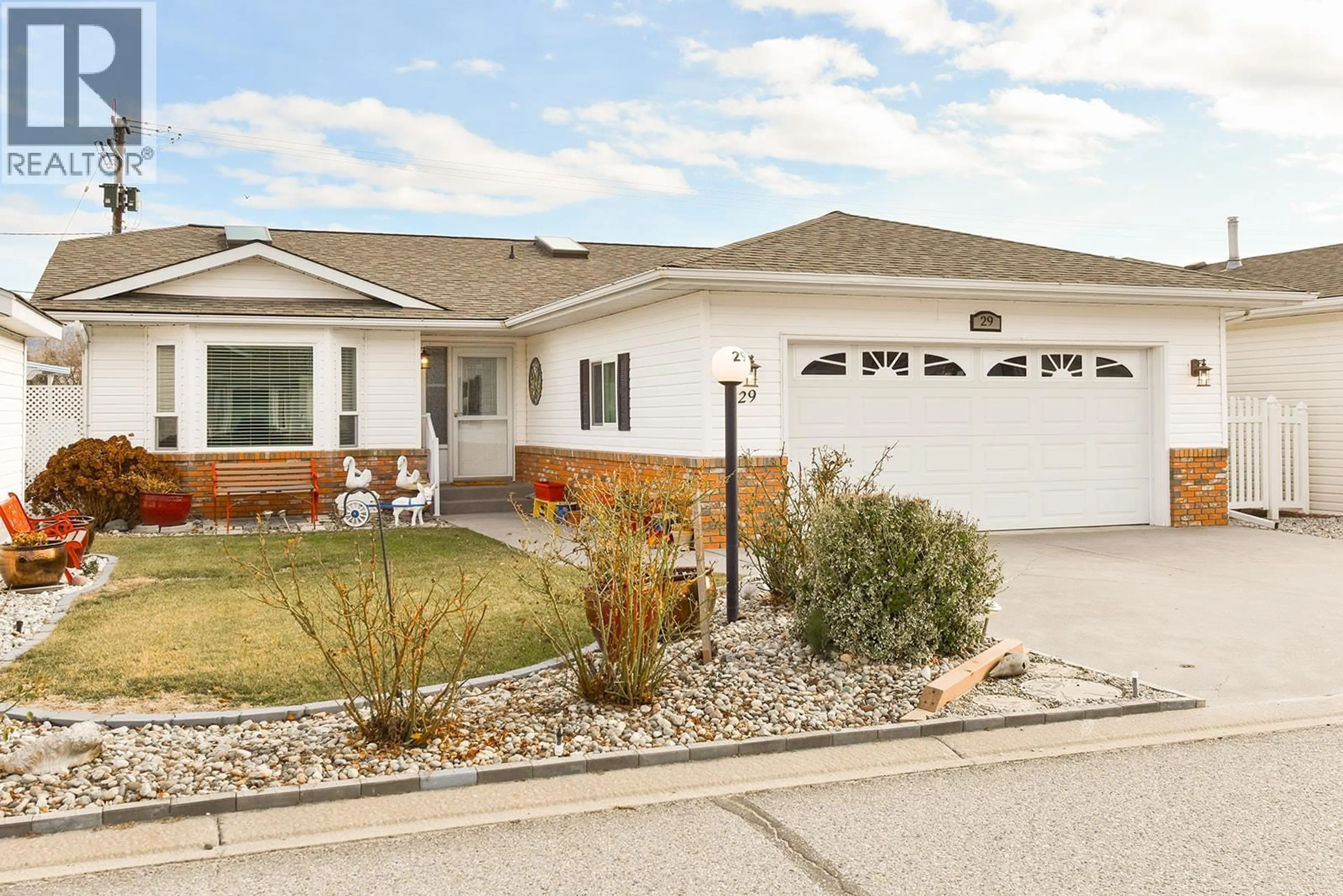 Home with vinyl exterior material, street for 29 KINGFISHER DRIVE, Penticton British Columbia V2A8K6