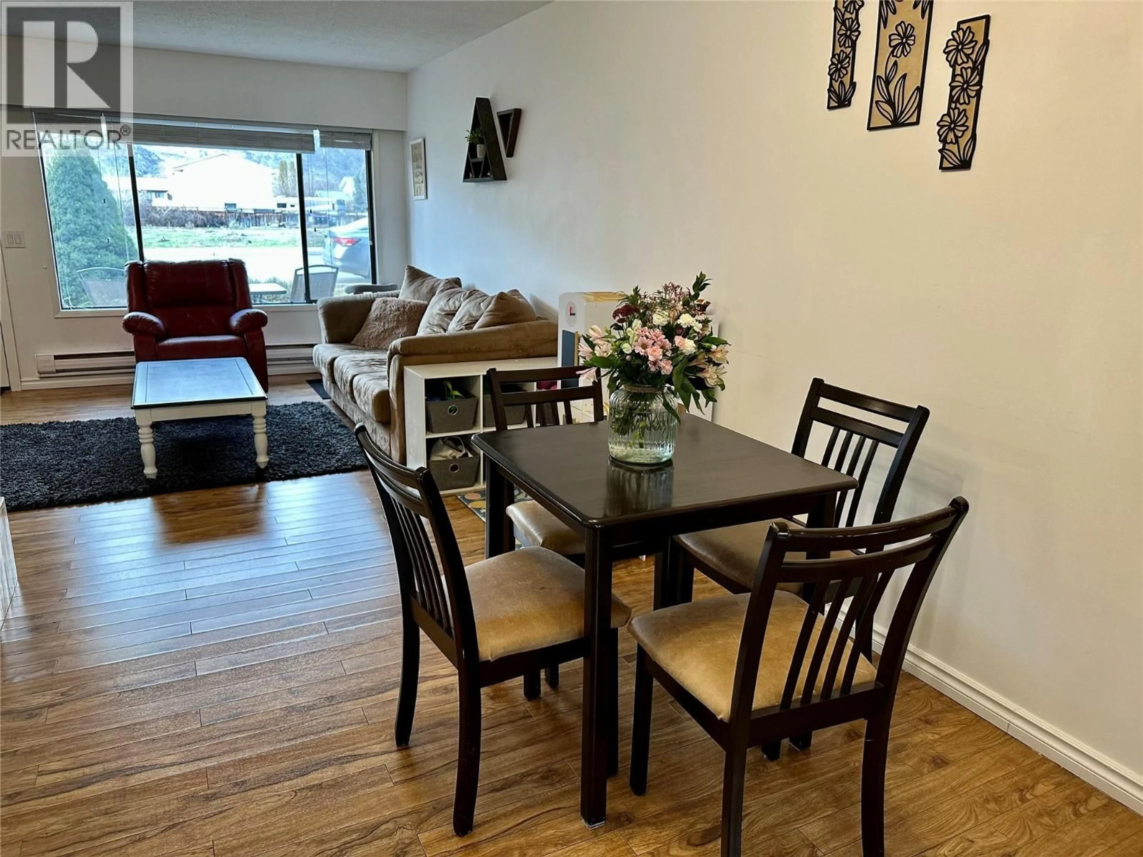 Living room with furniture, wood/laminate floor for 3 - 6435 PARK DRIVE, Oliver British Columbia V0H1T3