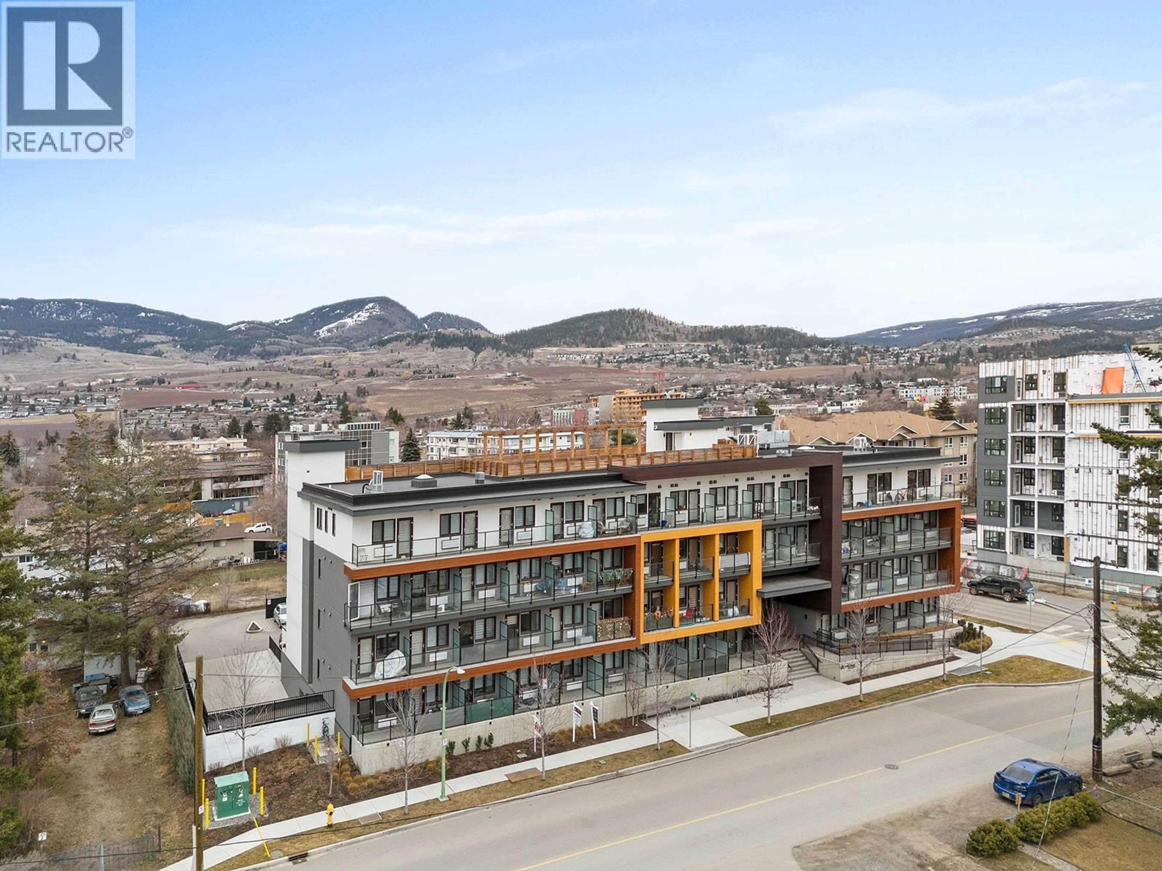 A pic from outside/outdoor area/front of a property/back of a property/a pic from drone, unknown for 327 - 345 DOUGALL ROAD NORTH, Kelowna British Columbia V1X0A8