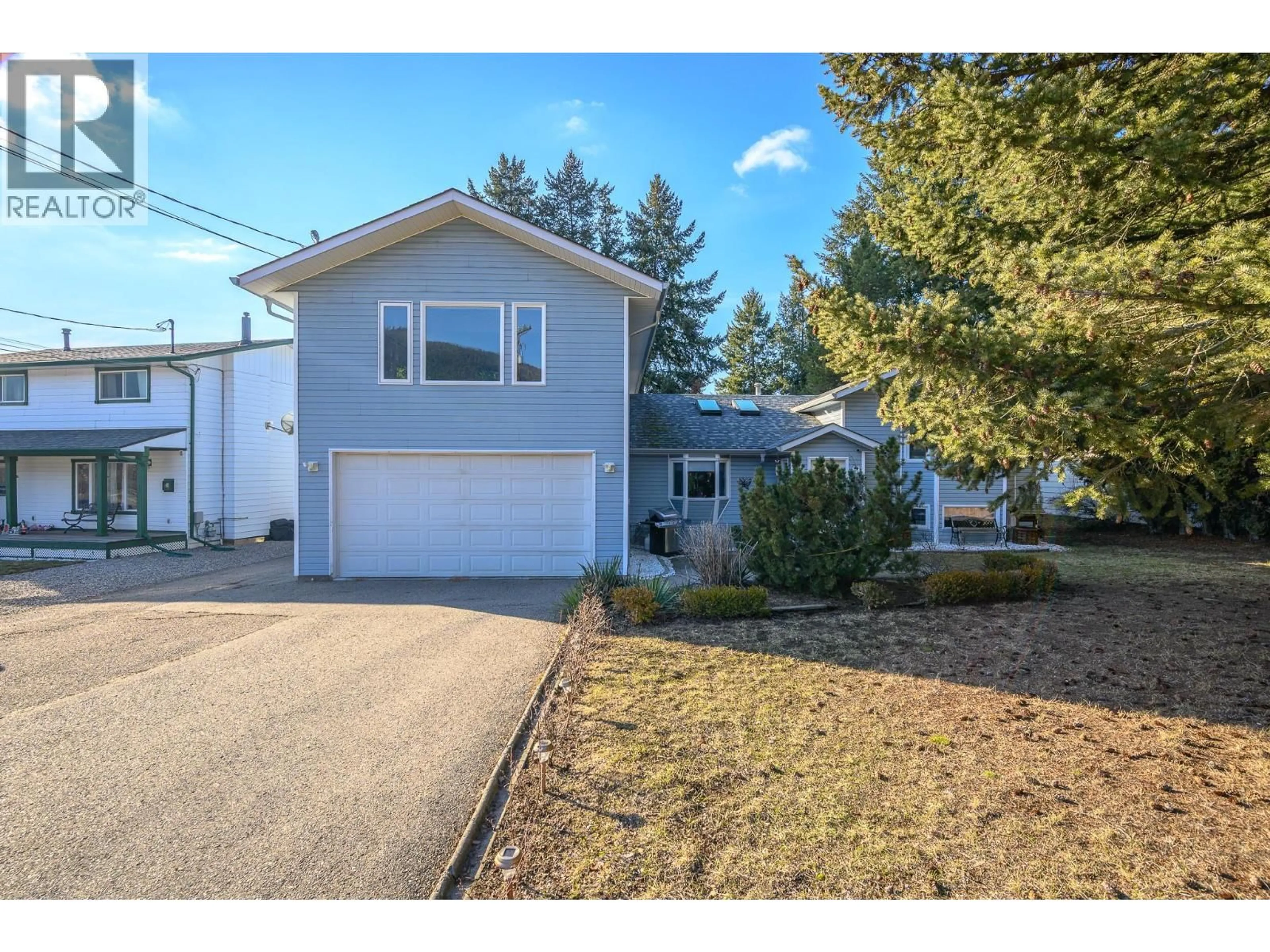 Home with vinyl exterior material, street for 5964 STAR ROAD, Vernon British Columbia V1B3P4