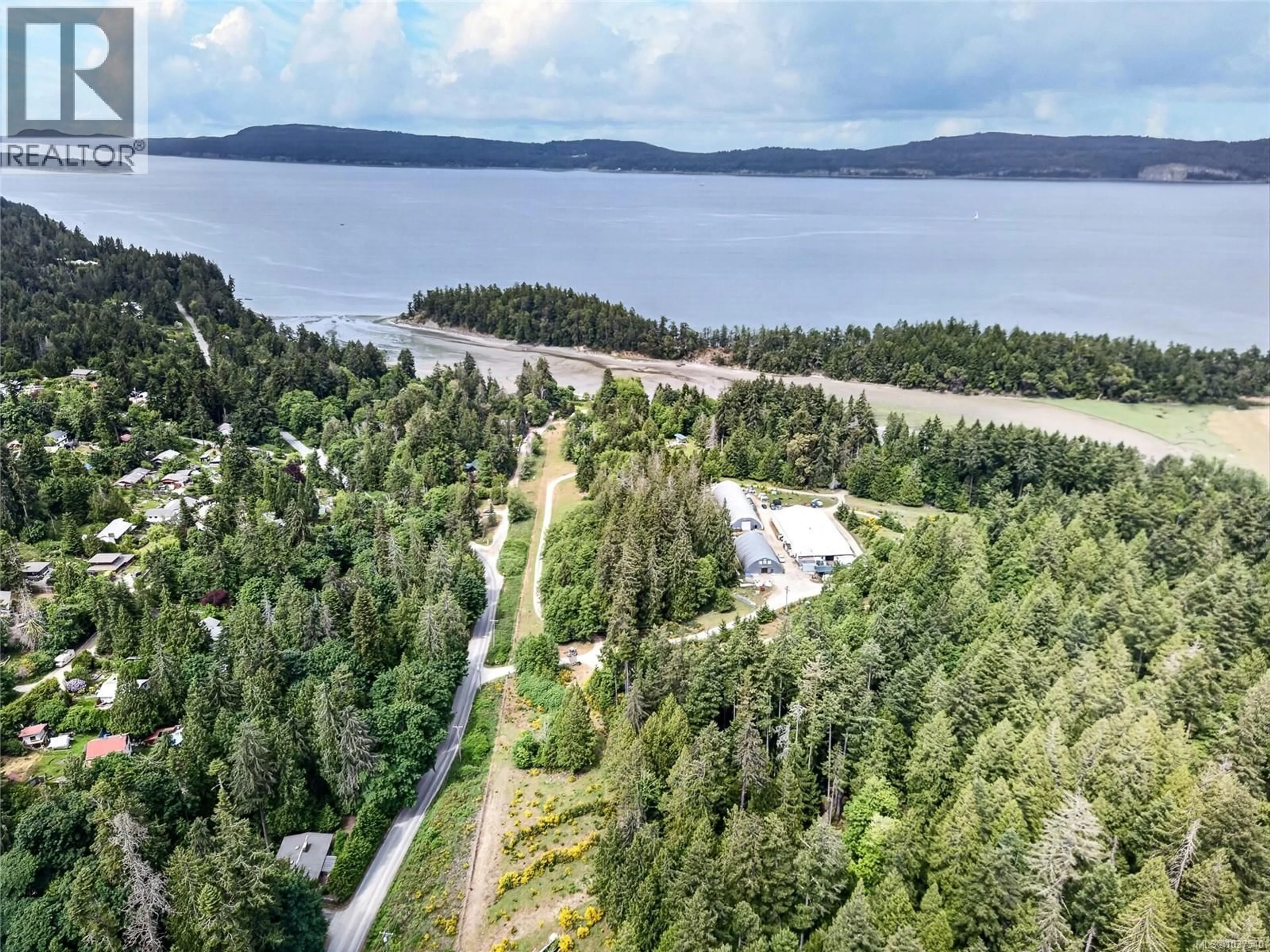 A pic from outside/outdoor area/front of a property/back of a property/a pic from drone, water/lake/river/ocean view for 300 WALKERS HOOK ROAD, Salt Spring British Columbia V8K1N7