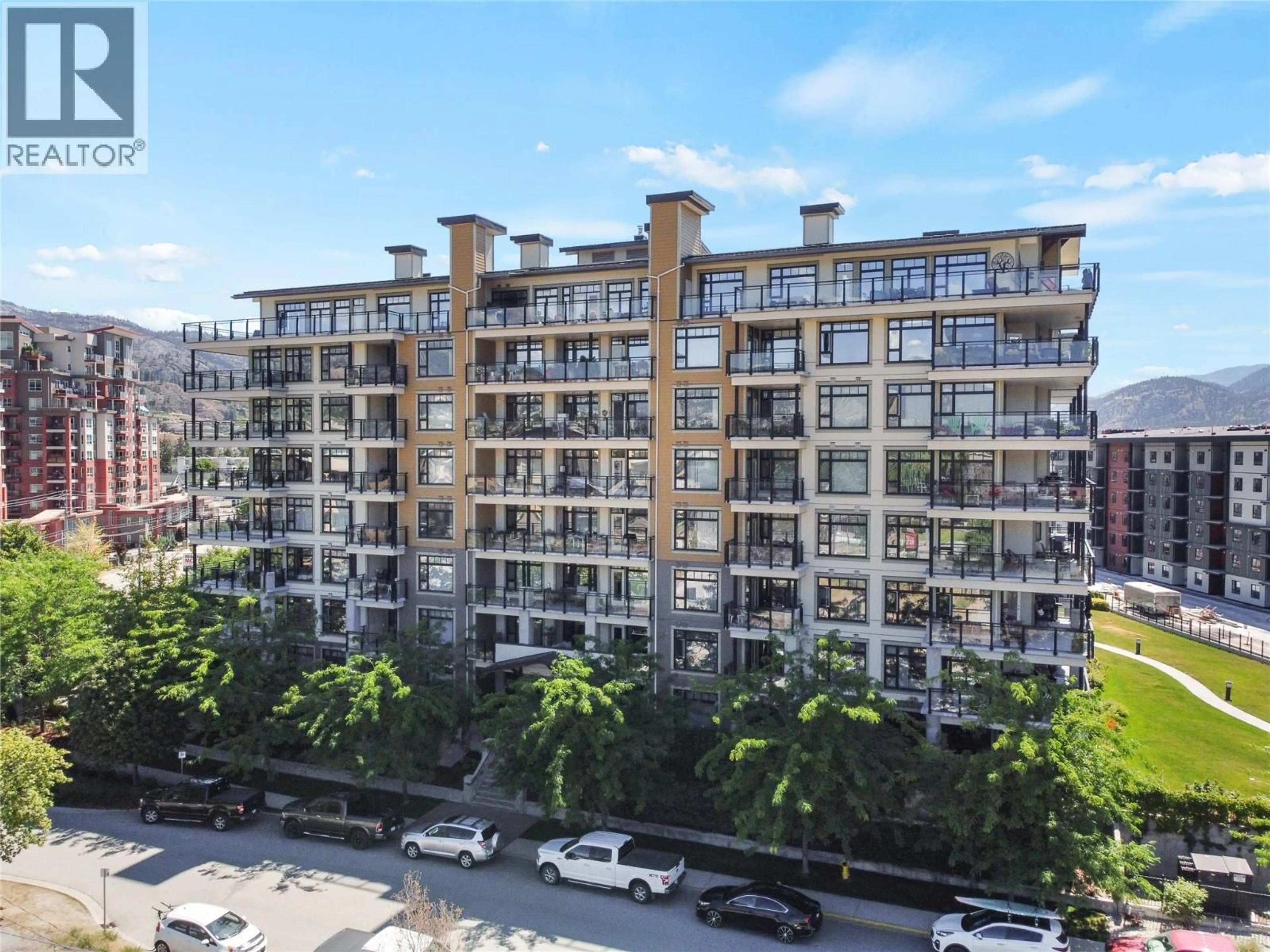 A pic from outside/outdoor area/front of a property/back of a property/a pic from drone, city buildings view from balcony for 208 - 3301 SKAHA LAKE ROAD, Penticton British Columbia V2A6G6