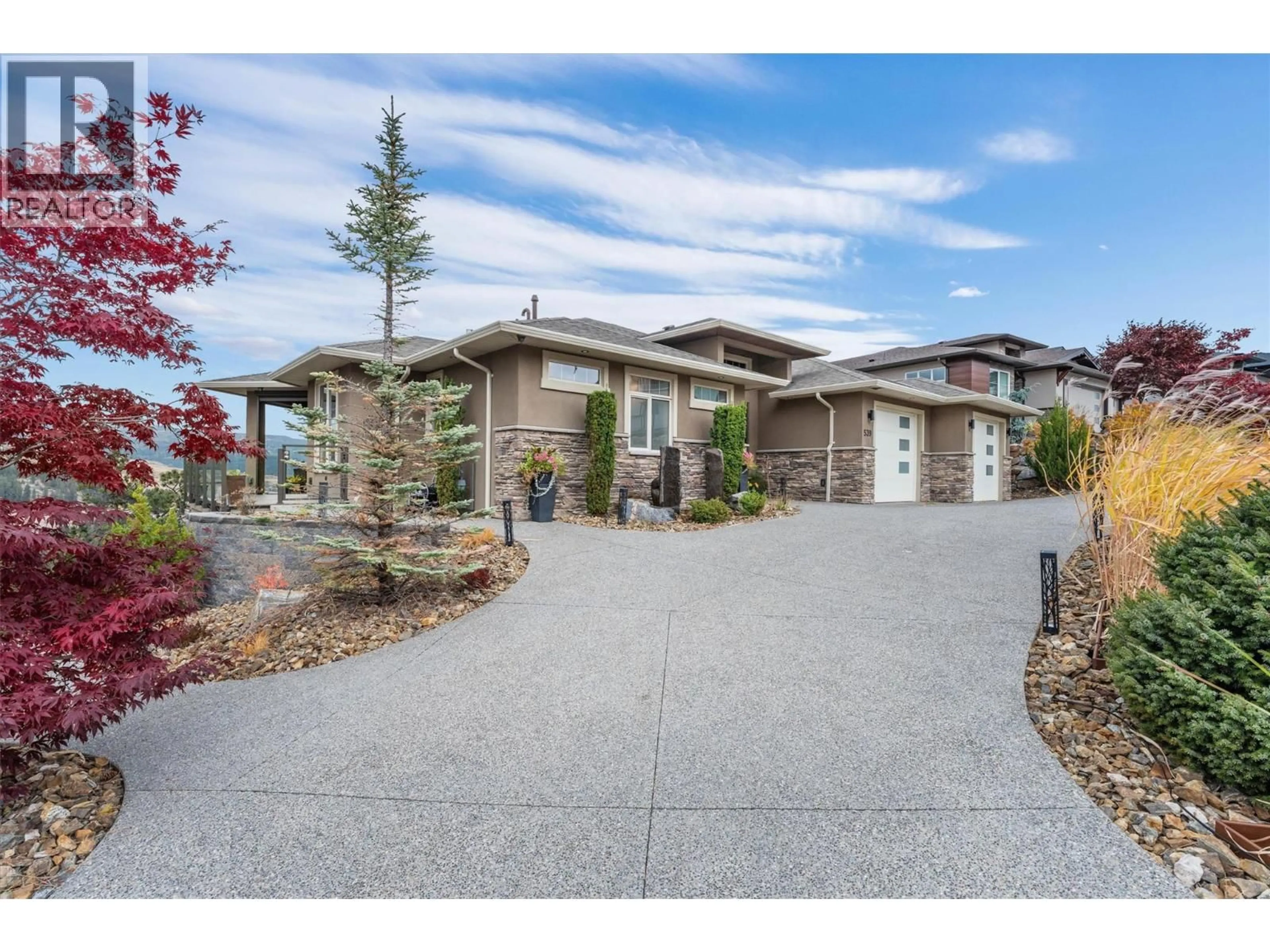 A pic from outside/outdoor area/front of a property/back of a property/a pic from drone, street for 539 CARNOUSTIE DRIVE, Kelowna British Columbia V1P1T1