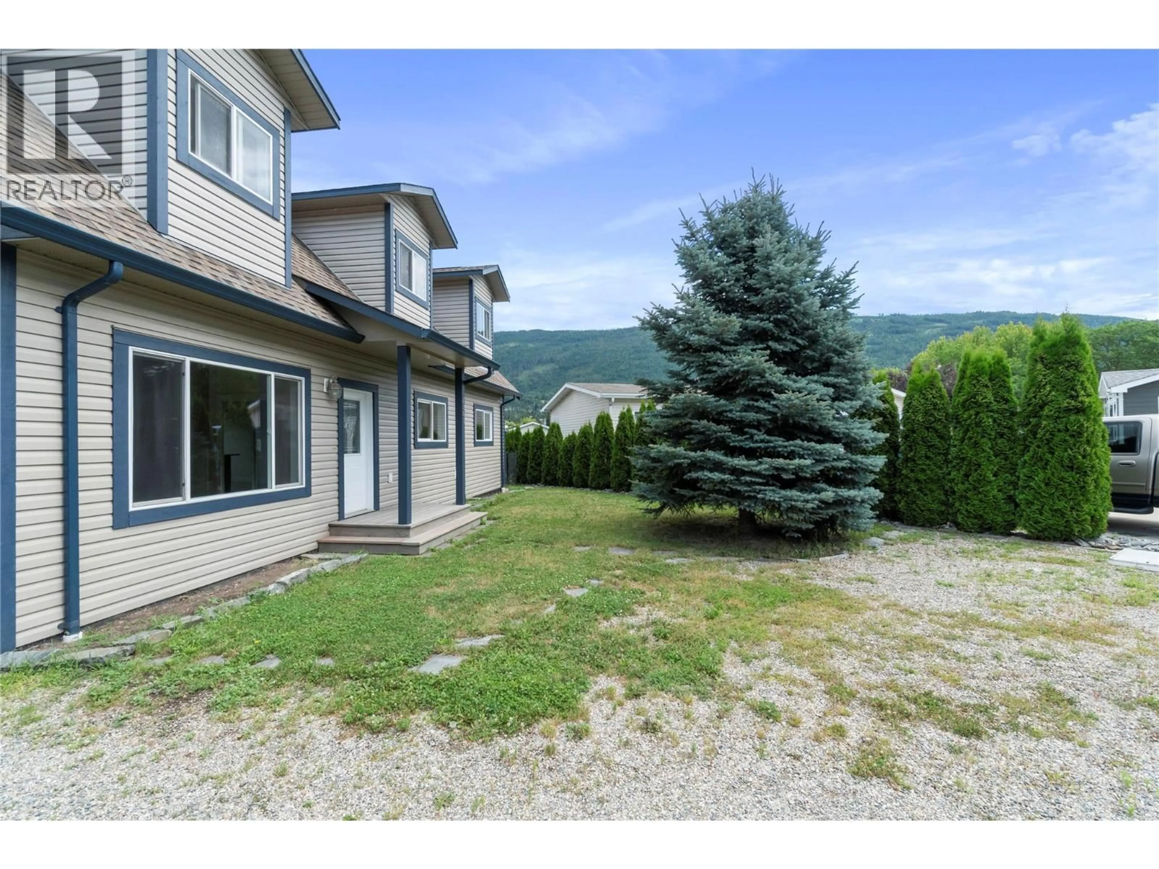 A pic from outside/outdoor area/front of a property/back of a property/a pic from drone, mountain view for 7281 46 STREET NORTHEAST, Salmon Arm British Columbia V1E2B3