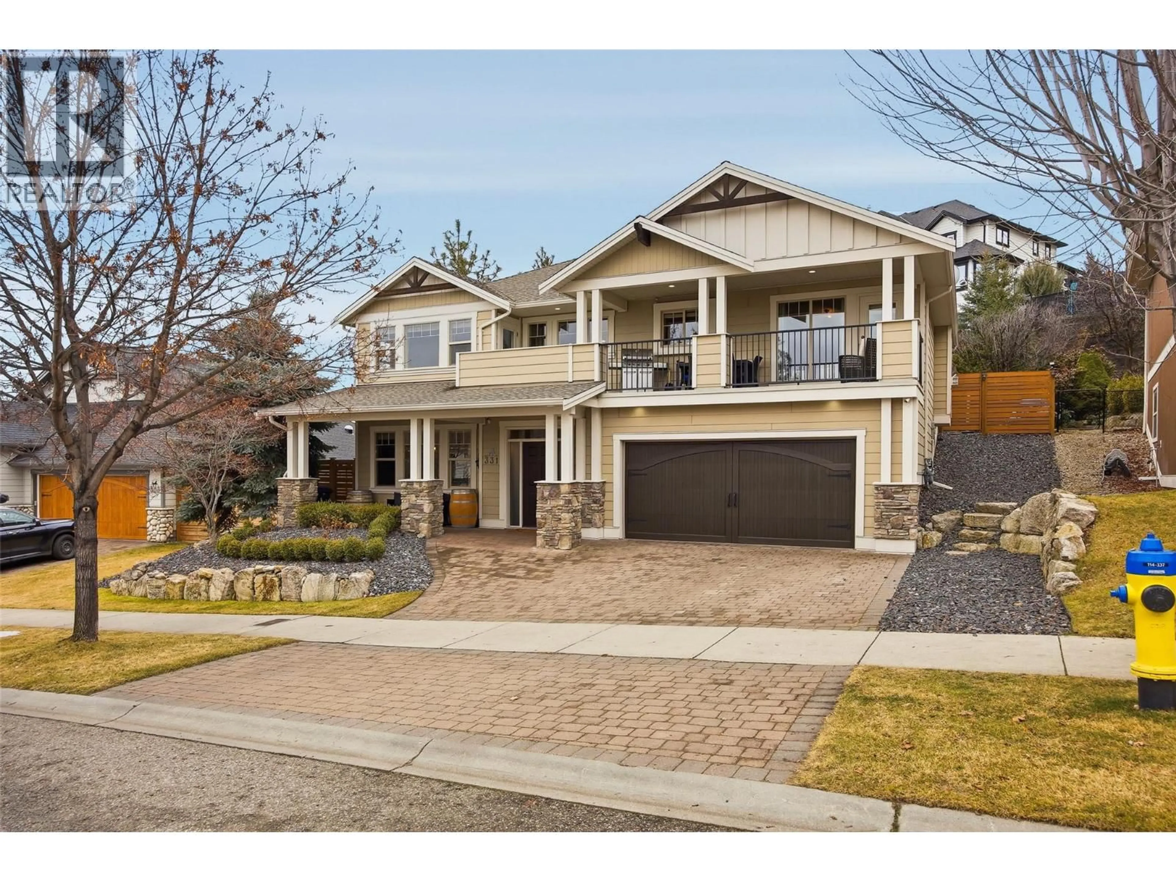 Home with brick exterior material, street for 331 QUILCHENA DRIVE, Kelowna British Columbia V1Y4Y9