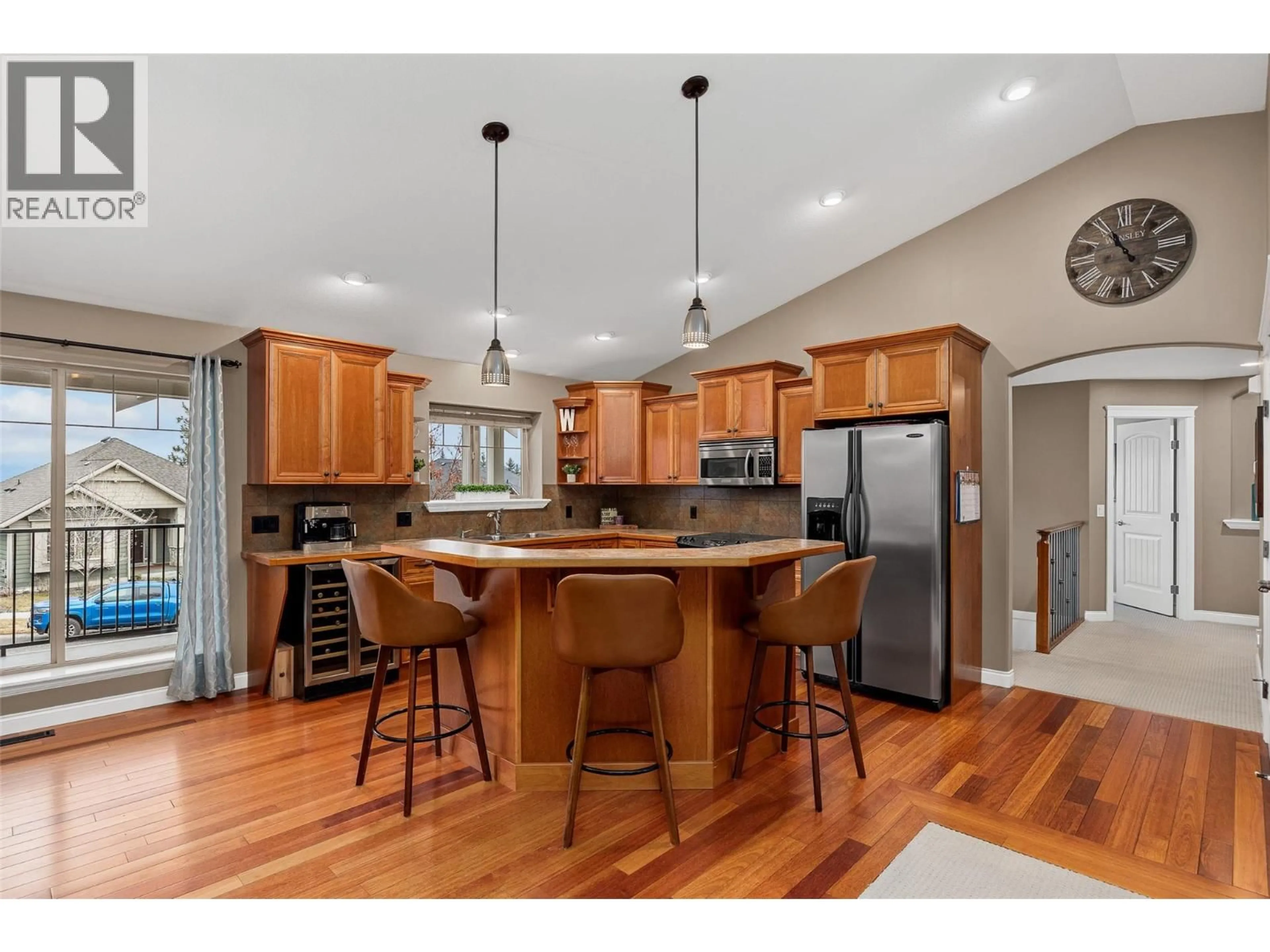 Open concept kitchen, wood/laminate floor for 331 QUILCHENA DRIVE, Kelowna British Columbia V1Y4Y9