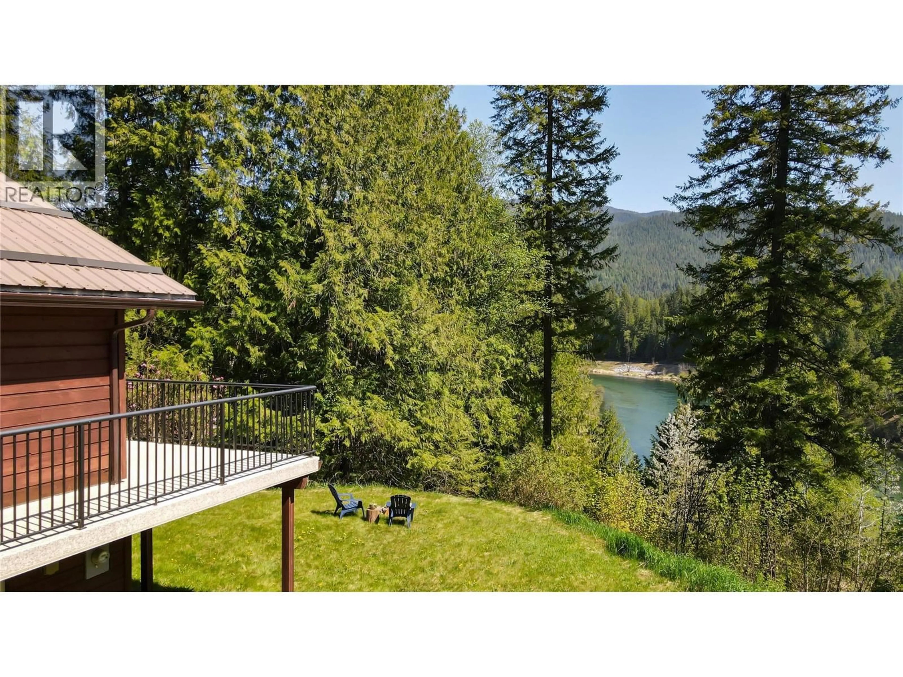 A pic from outside/outdoor area/front of a property/back of a property/a pic from drone, water/lake/river/ocean view for 5949 SLOCAN RIVER ROAD, Appledale British Columbia V0G2J0