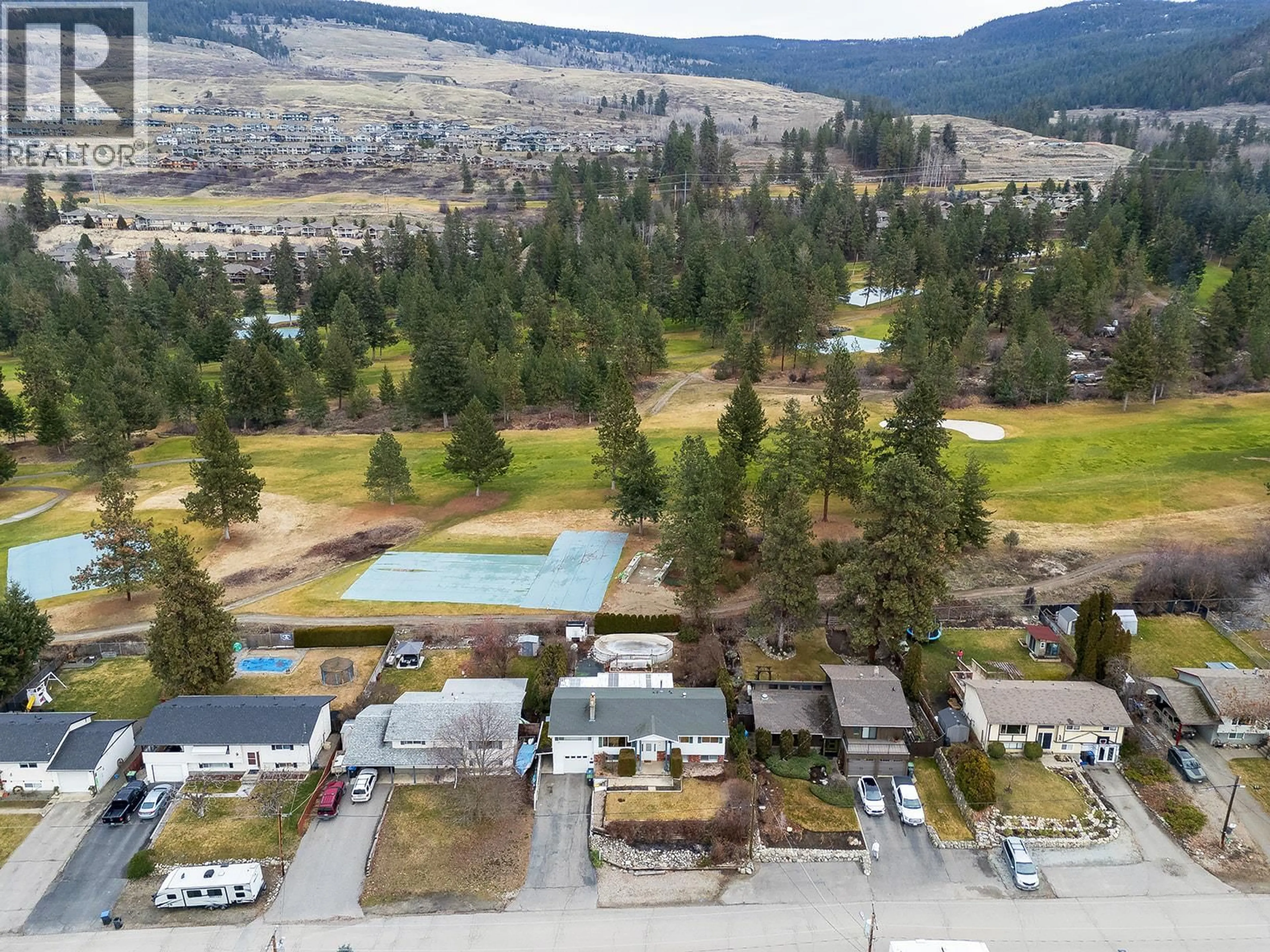 A pic from outside/outdoor area/front of a property/back of a property/a pic from drone, mountain view for 3541 ESQUIRE ROAD, Kelowna British Columbia V1X6L3