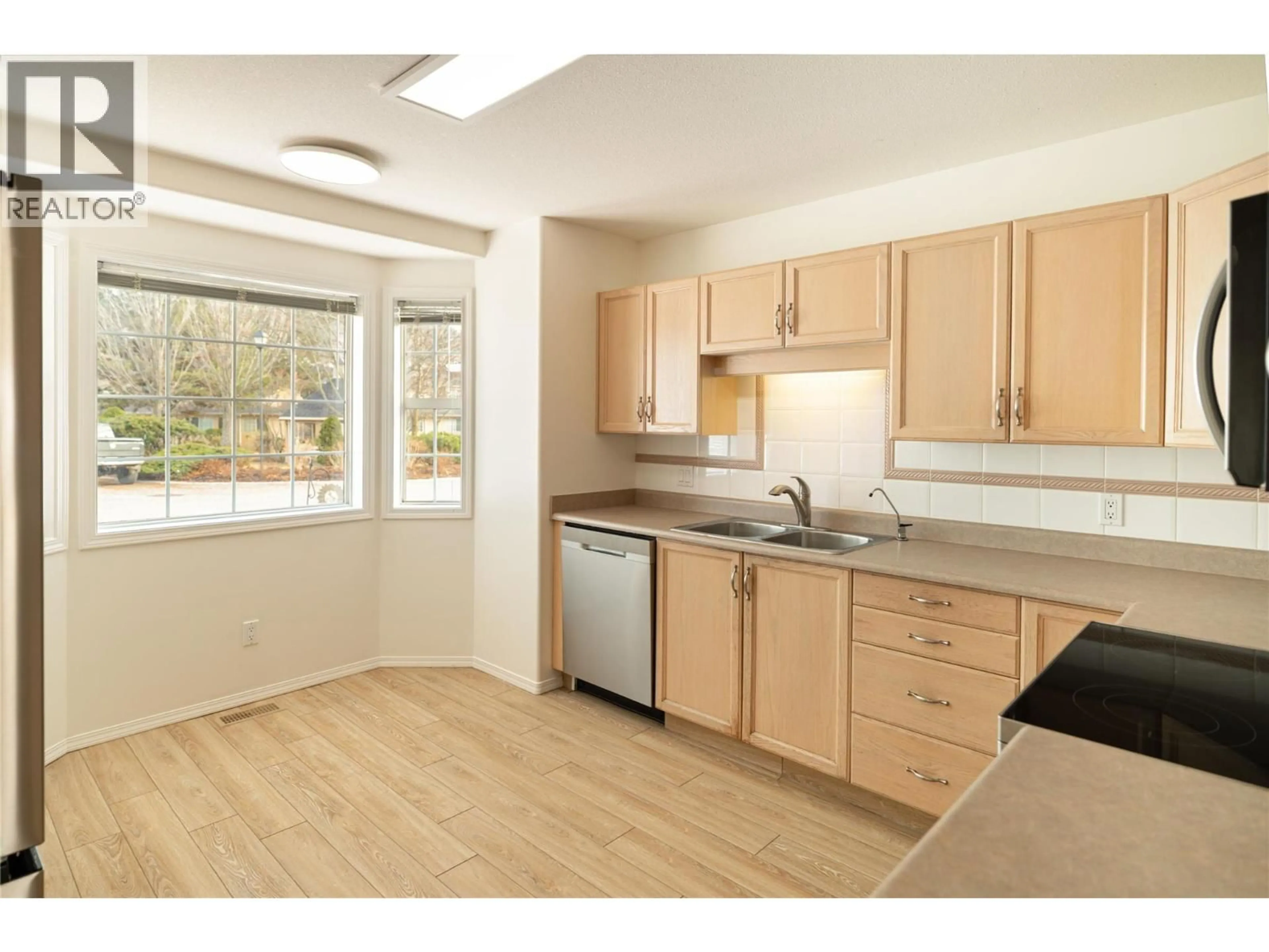 Standard kitchen, wood/laminate floor for 26 - 527 YATES ROAD, Kelowna British Columbia V1V1Z5