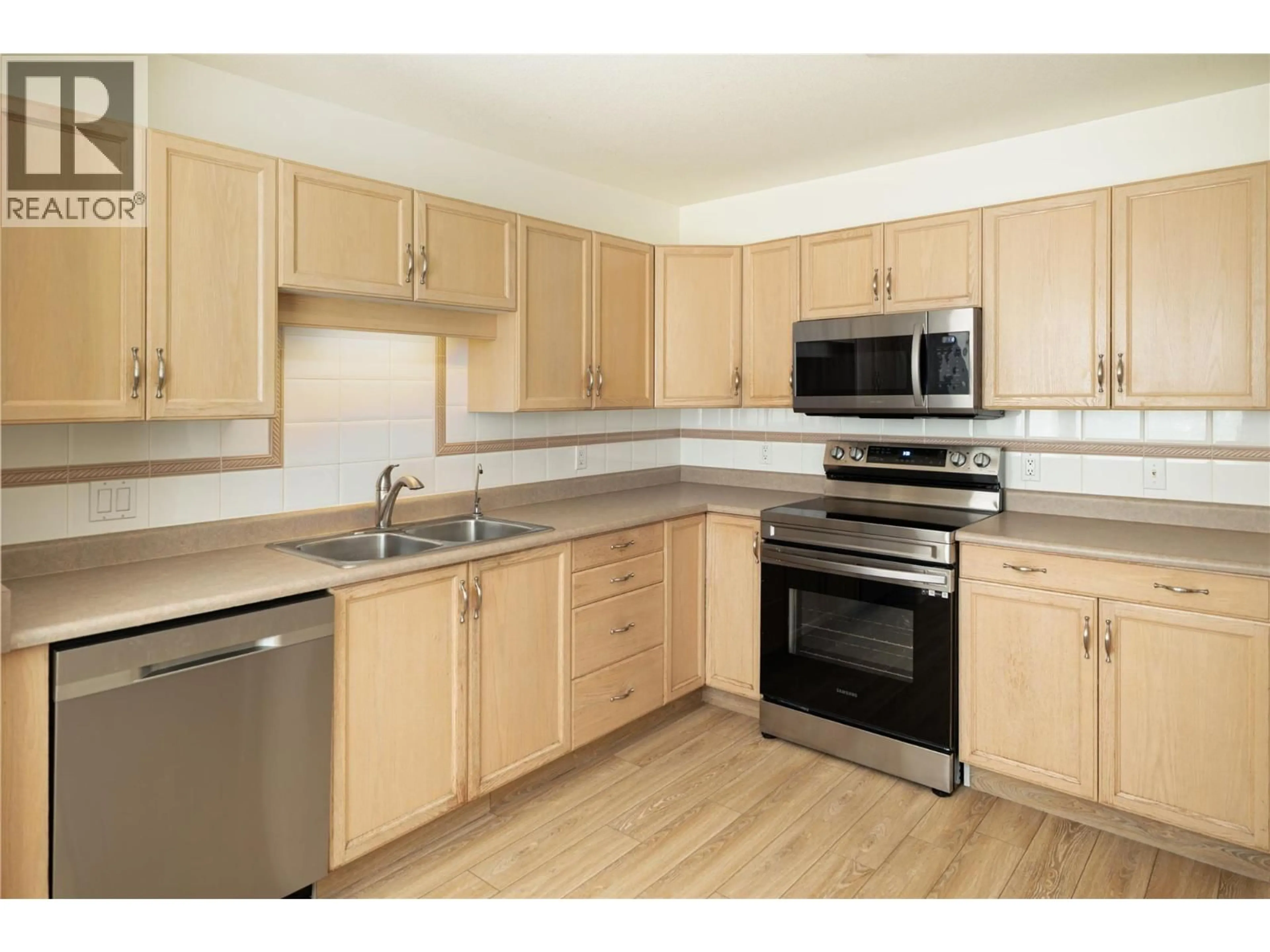 Standard kitchen, wood/laminate floor for 26 - 527 YATES ROAD, Kelowna British Columbia V1V1Z5