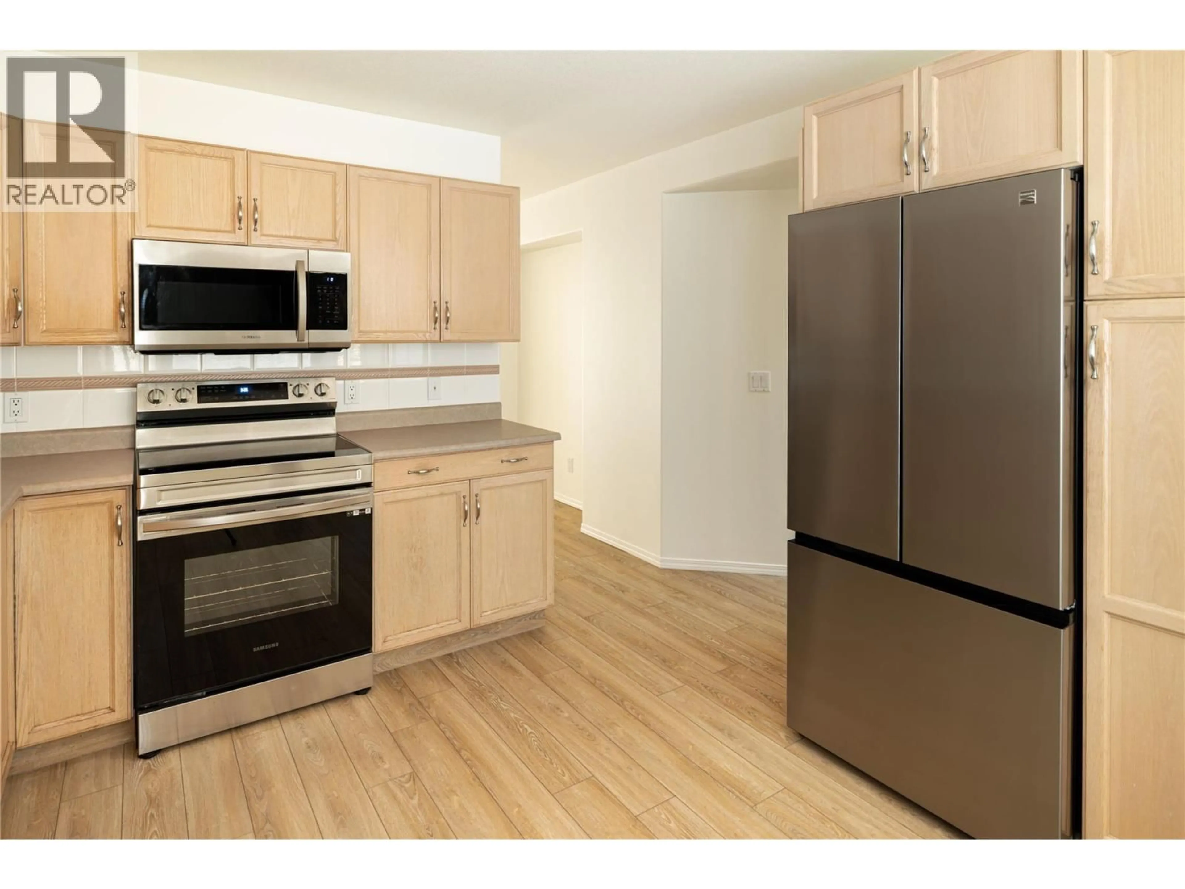 Standard kitchen, wood/laminate floor for 26 - 527 YATES ROAD, Kelowna British Columbia V1V1Z5