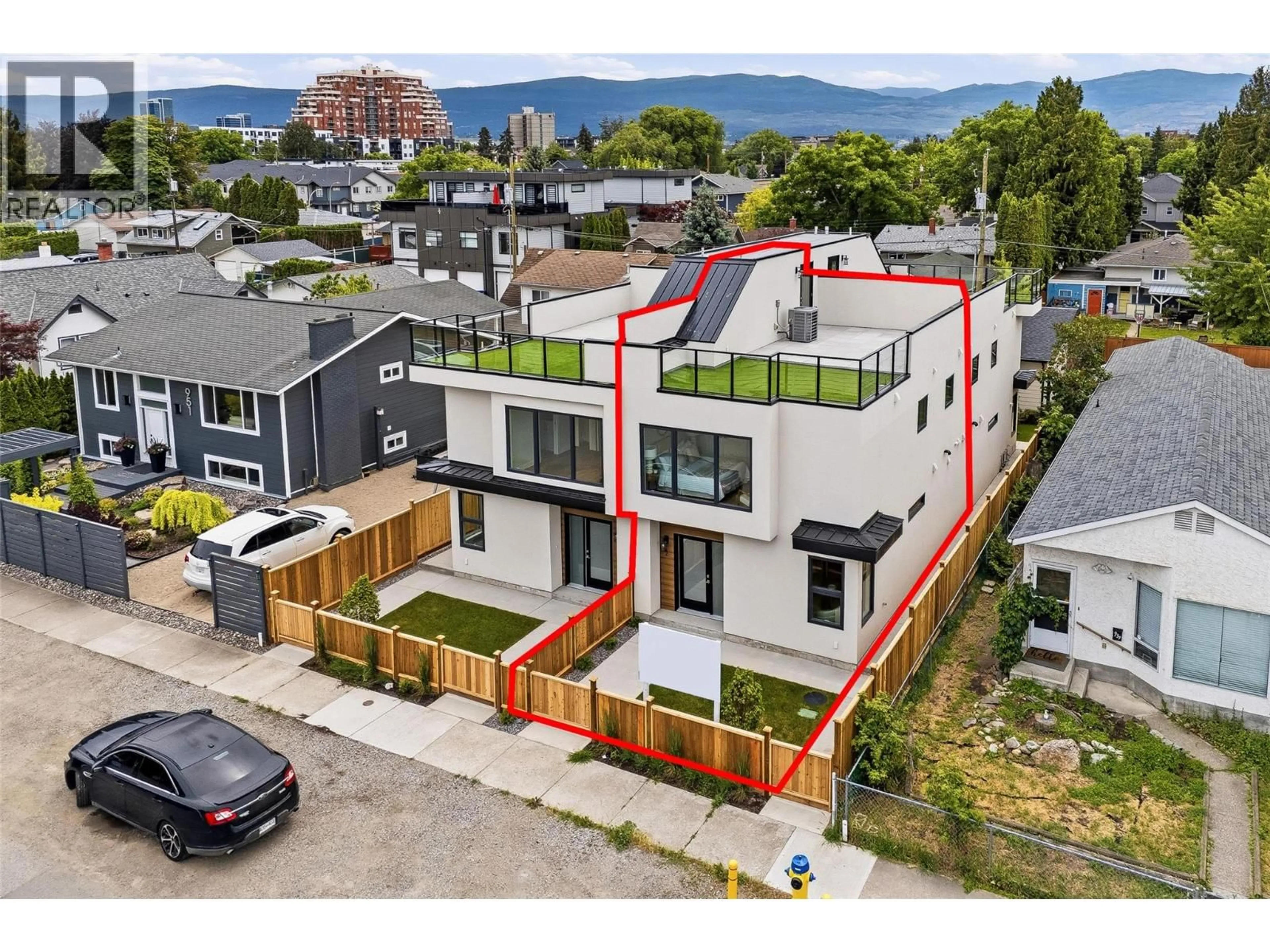 A pic from outside/outdoor area/front of a property/back of a property/a pic from drone, mountain view for 2 - 943 FULLER AVENUE, Kelowna British Columbia V1Y6X5