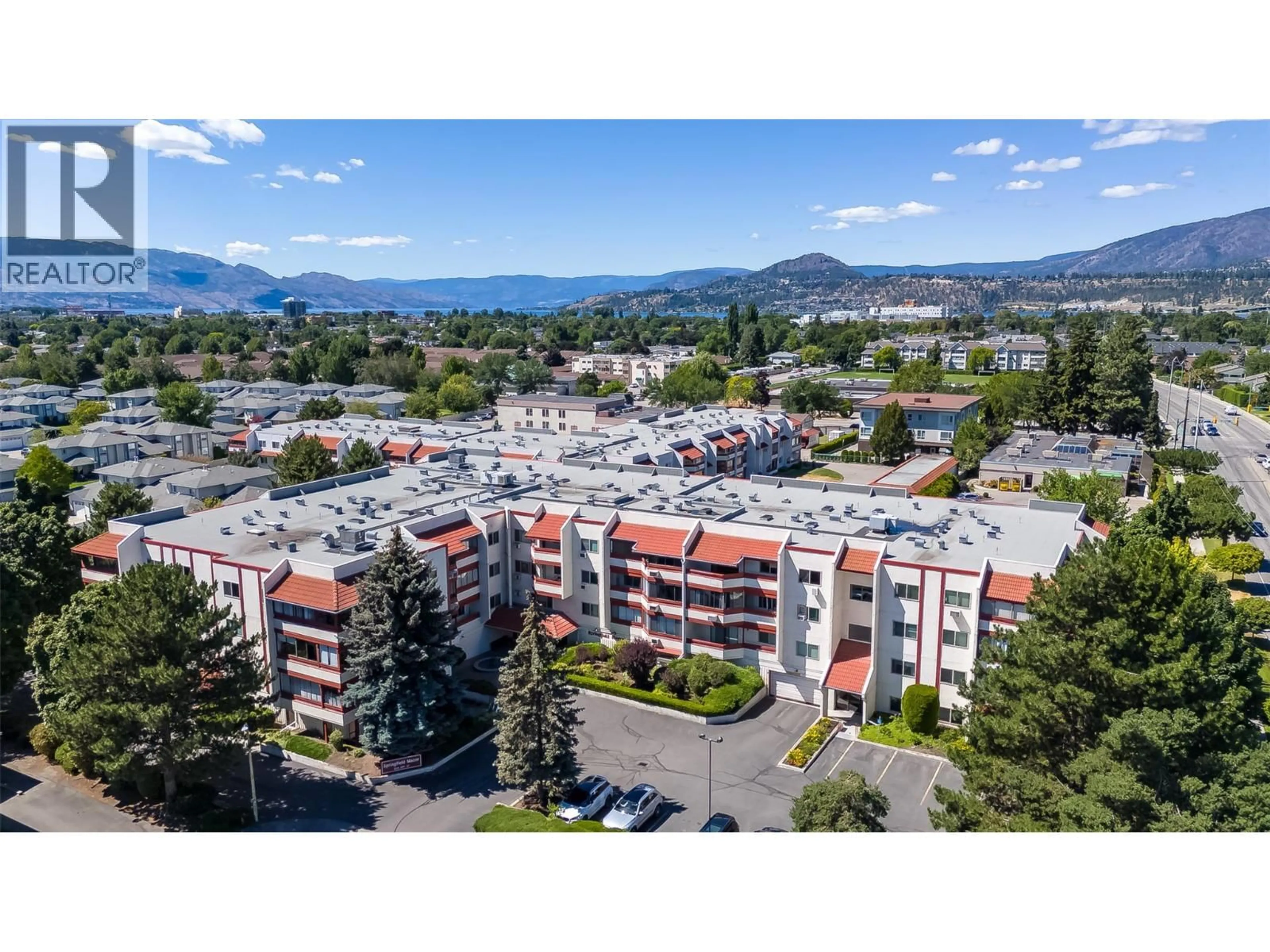 A pic from outside/outdoor area/front of a property/back of a property/a pic from drone, mountain view for 306 - 2110 HOY STREET, Kelowna British Columbia V1Y8T4
