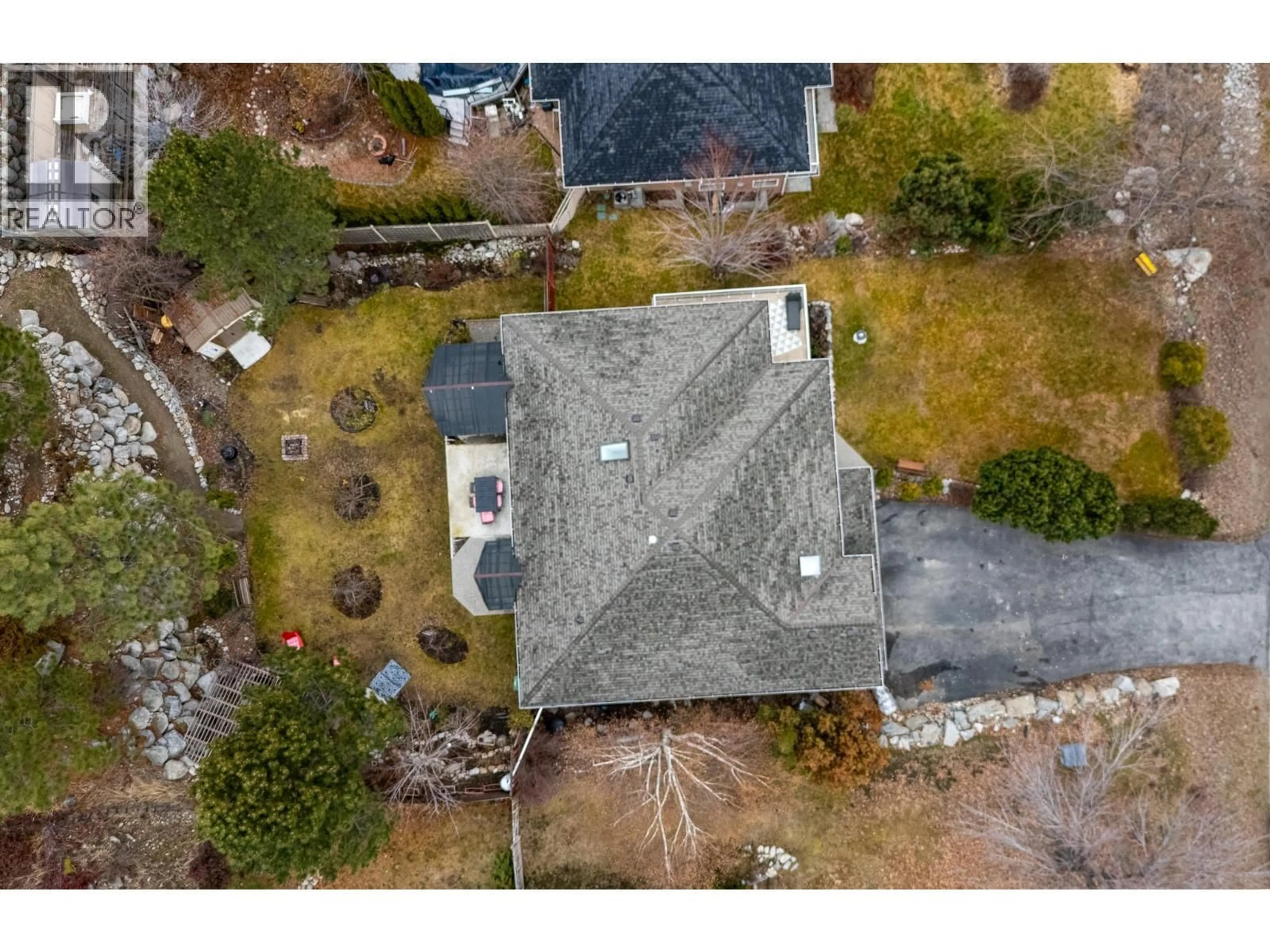 A pic from outside/outdoor area/front of a property/back of a property/a pic from drone, street for 144 CHRISTIE MOUNTAIN LANE, Okanagan Falls British Columbia V0H1R3