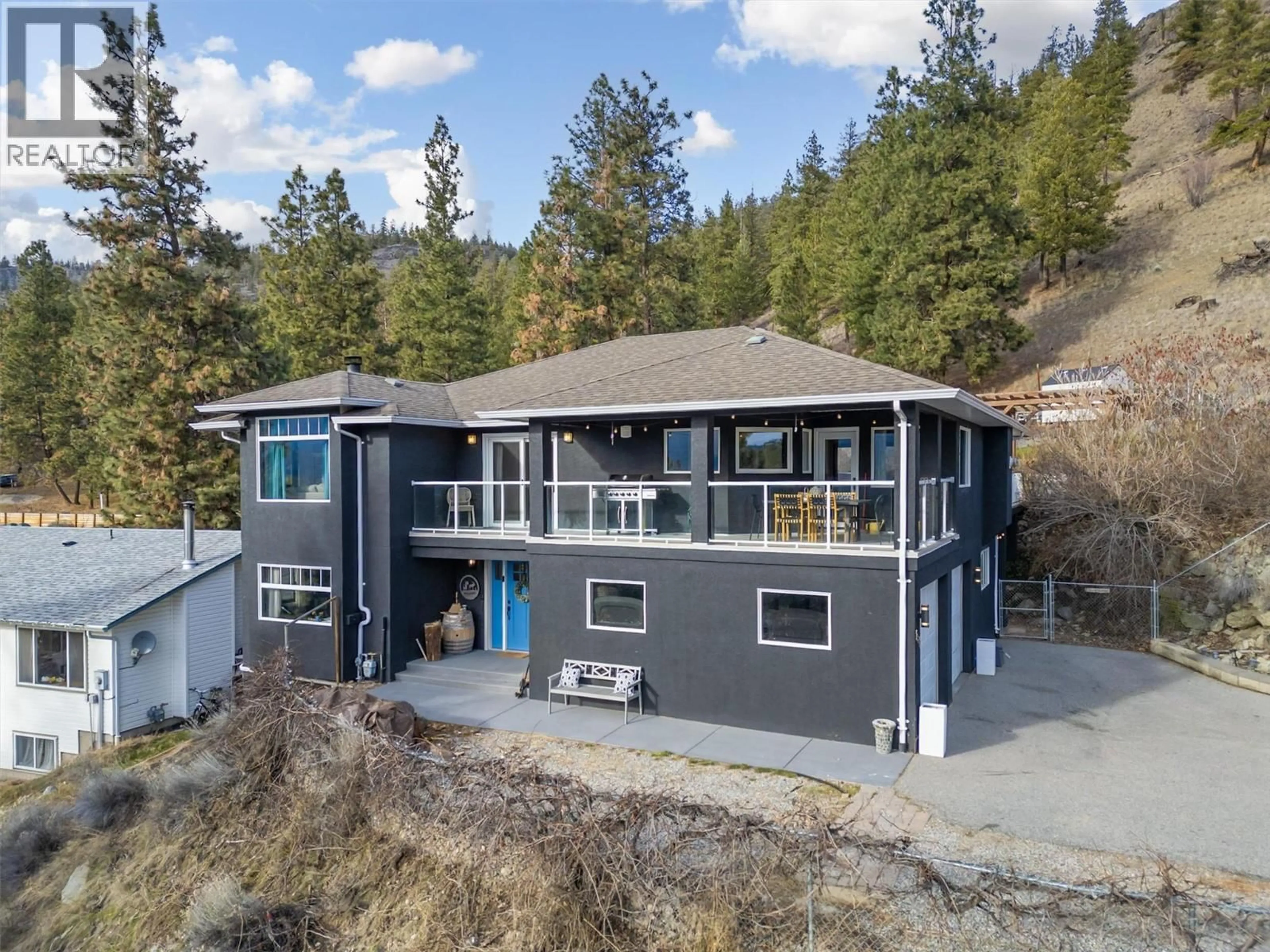 A pic from outside/outdoor area/front of a property/back of a property/a pic from drone, water/lake/river/ocean view for 13411 HERMISTON DRIVE, Summerland British Columbia V0H1Z8