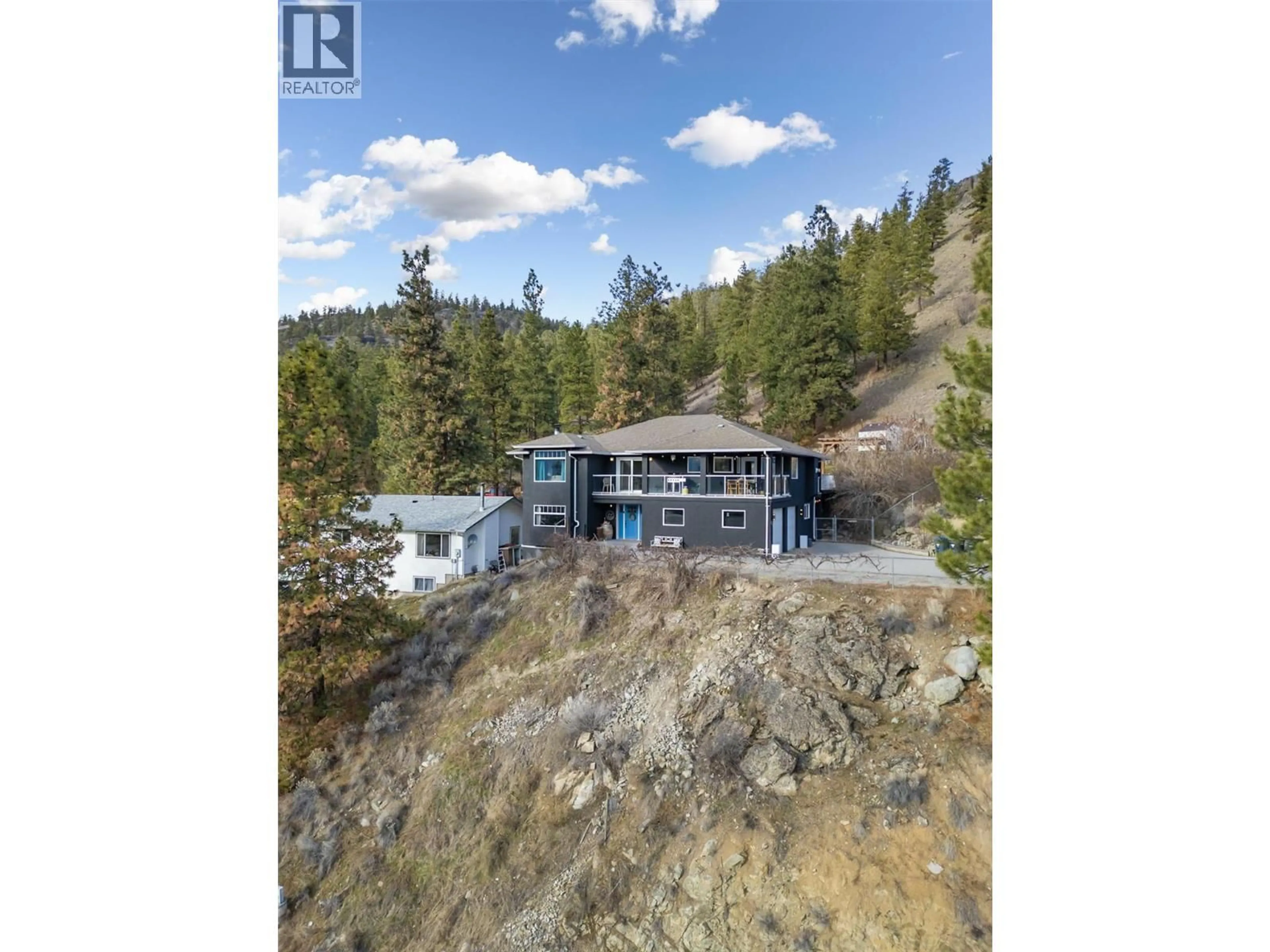 A pic from outside/outdoor area/front of a property/back of a property/a pic from drone, water/lake/river/ocean view for 13411 HERMISTON DRIVE, Summerland British Columbia V0H1Z8