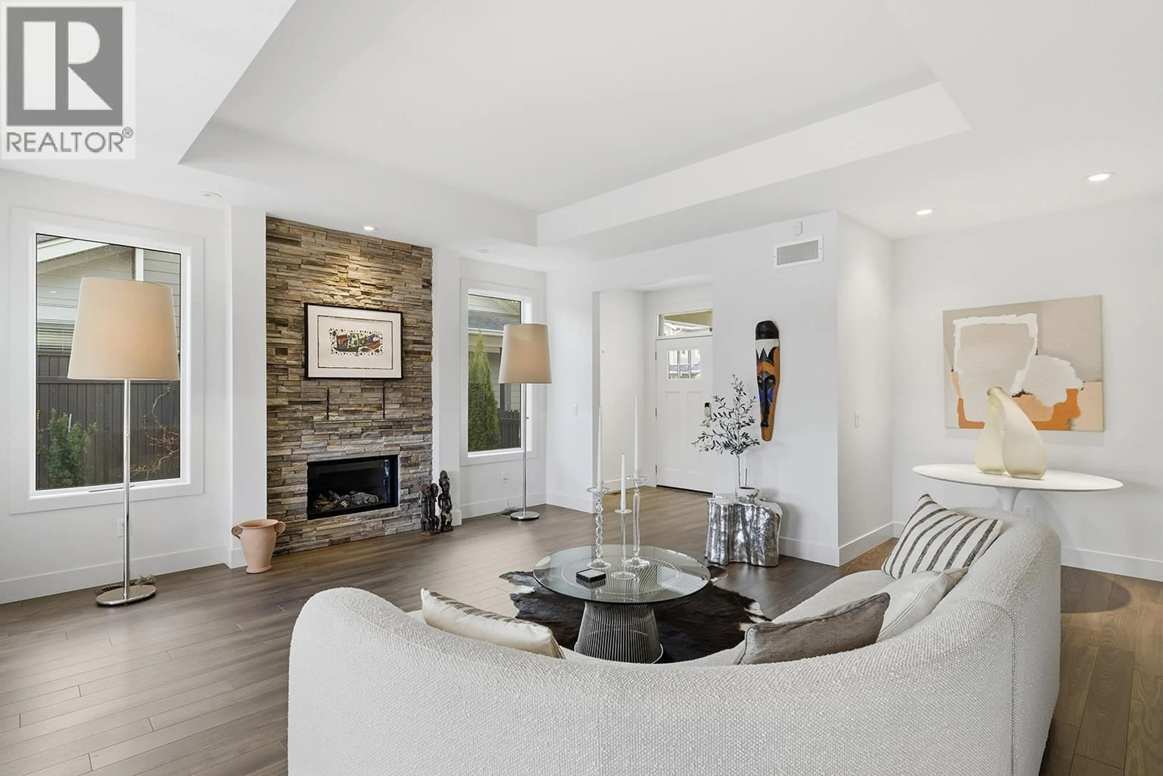 Living room with furniture, ceramic/tile floor for 52 - 1960 KLO ROAD, Kelowna British Columbia V1W5L2