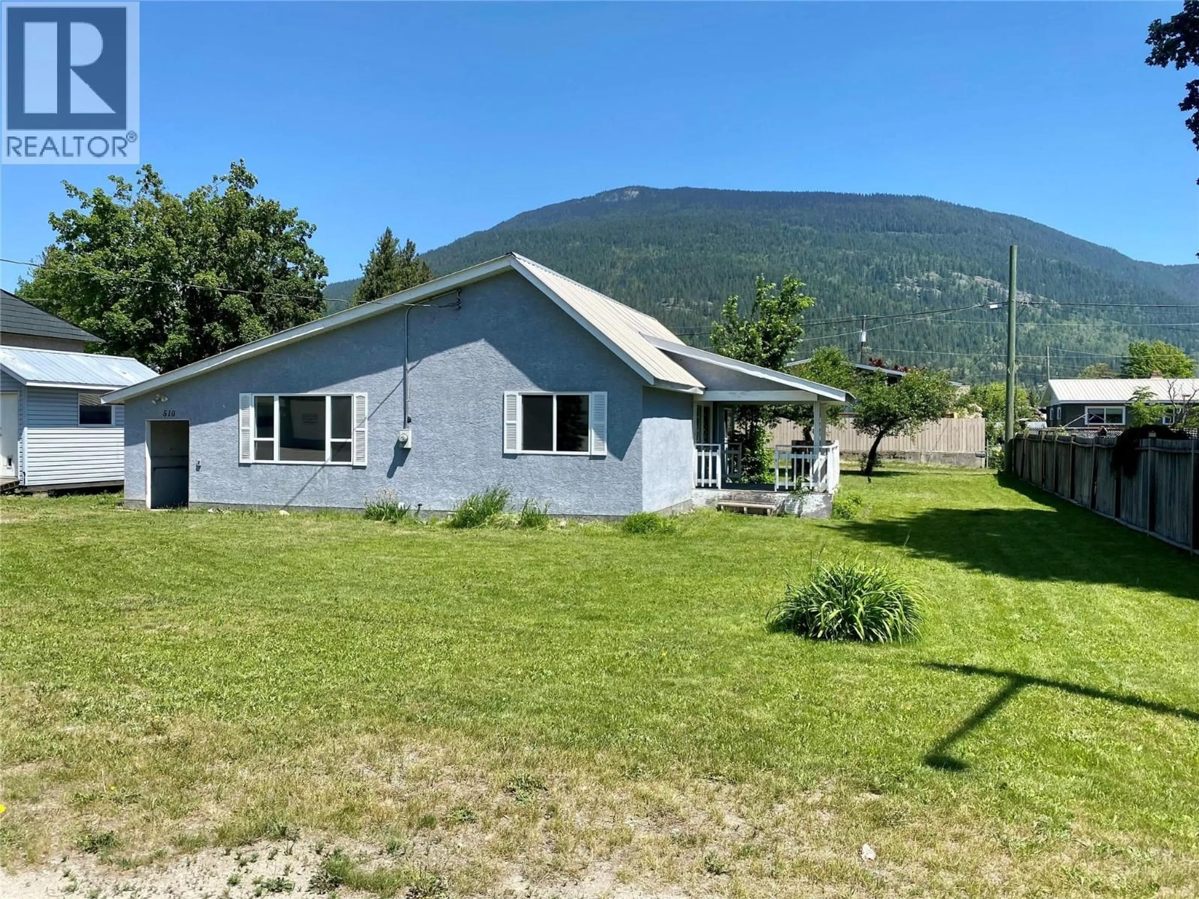 A pic from outside/outdoor area/front of a property/back of a property/a pic from drone, mountain view for 510 TENTH STREET EAST, Revelstoke British Columbia V0E2S0