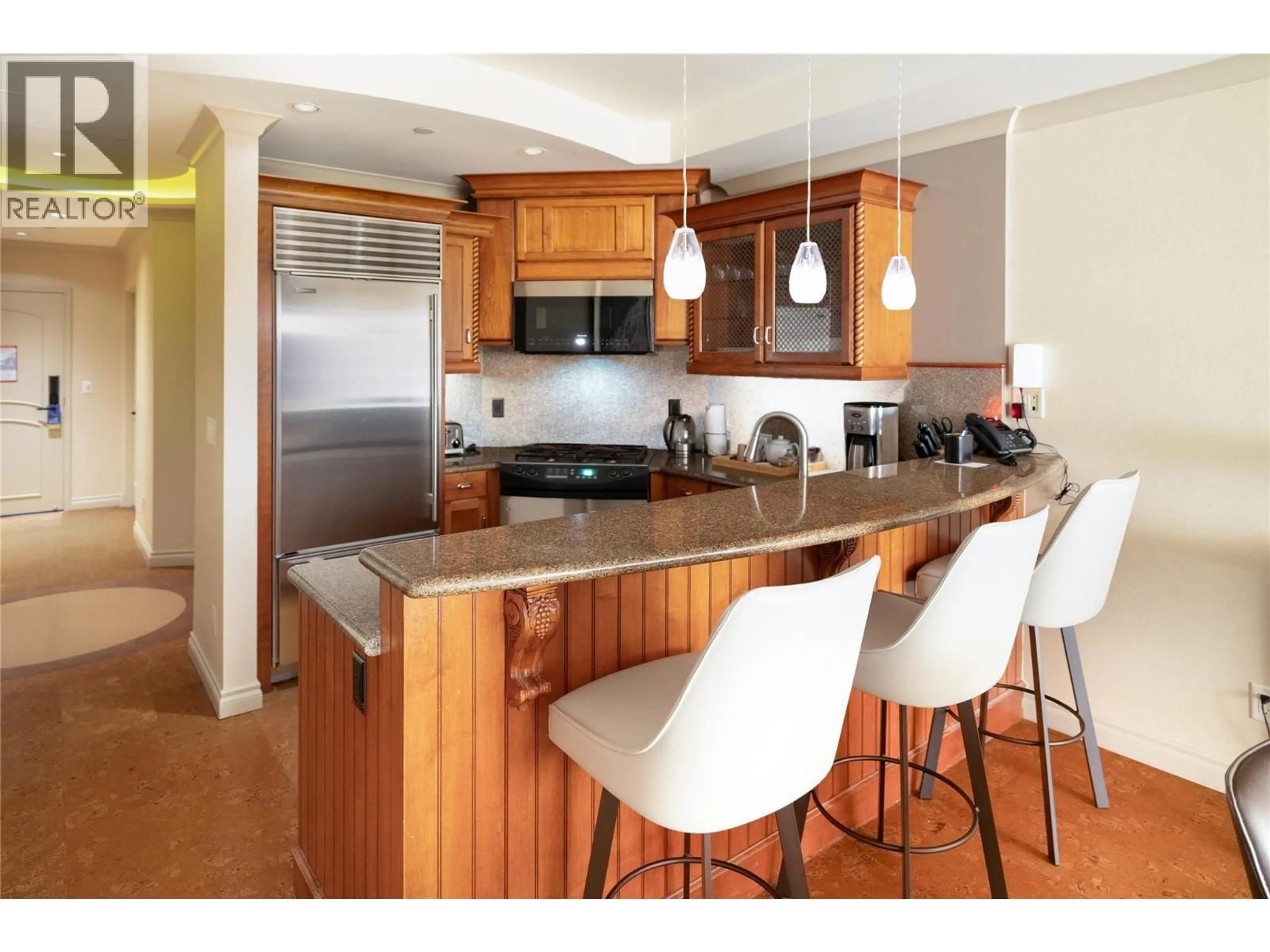 Open concept kitchen, wood/laminate floor for 464 (B12) - 1288 WATER STREET, Kelowna British Columbia V1Y9P4