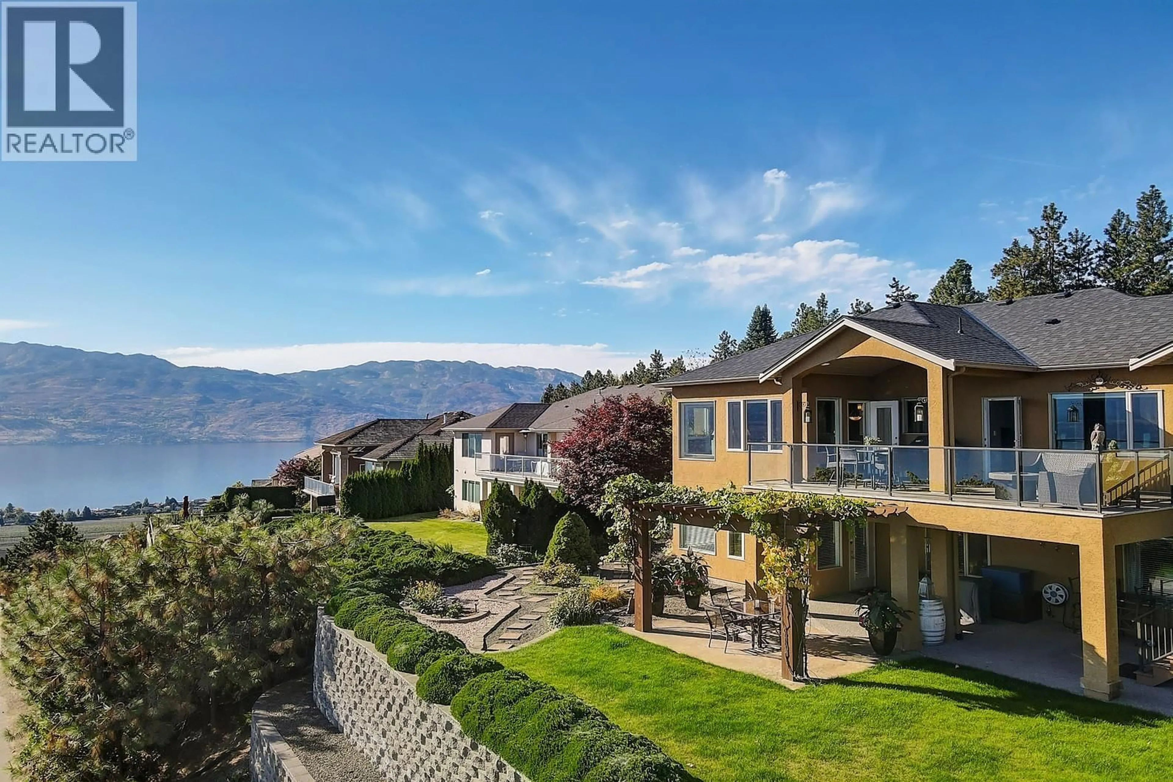 A pic from outside/outdoor area/front of a property/back of a property/a pic from drone, mountain view for 3529 GALA VIEW DRIVE, West Kelowna British Columbia V4T2M3