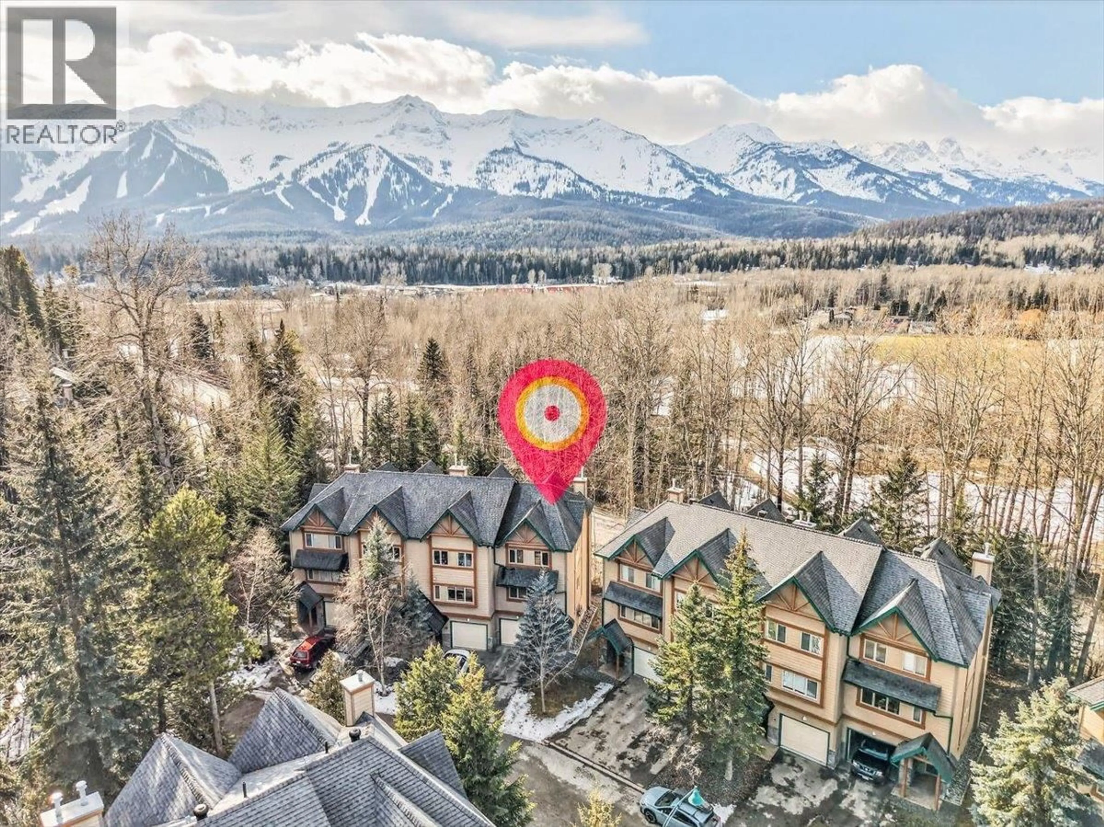A pic from outside/outdoor area/front of a property/back of a property/a pic from drone, mountain view for A - 8 CREEK PLACE, Fernie British Columbia V0B1M4