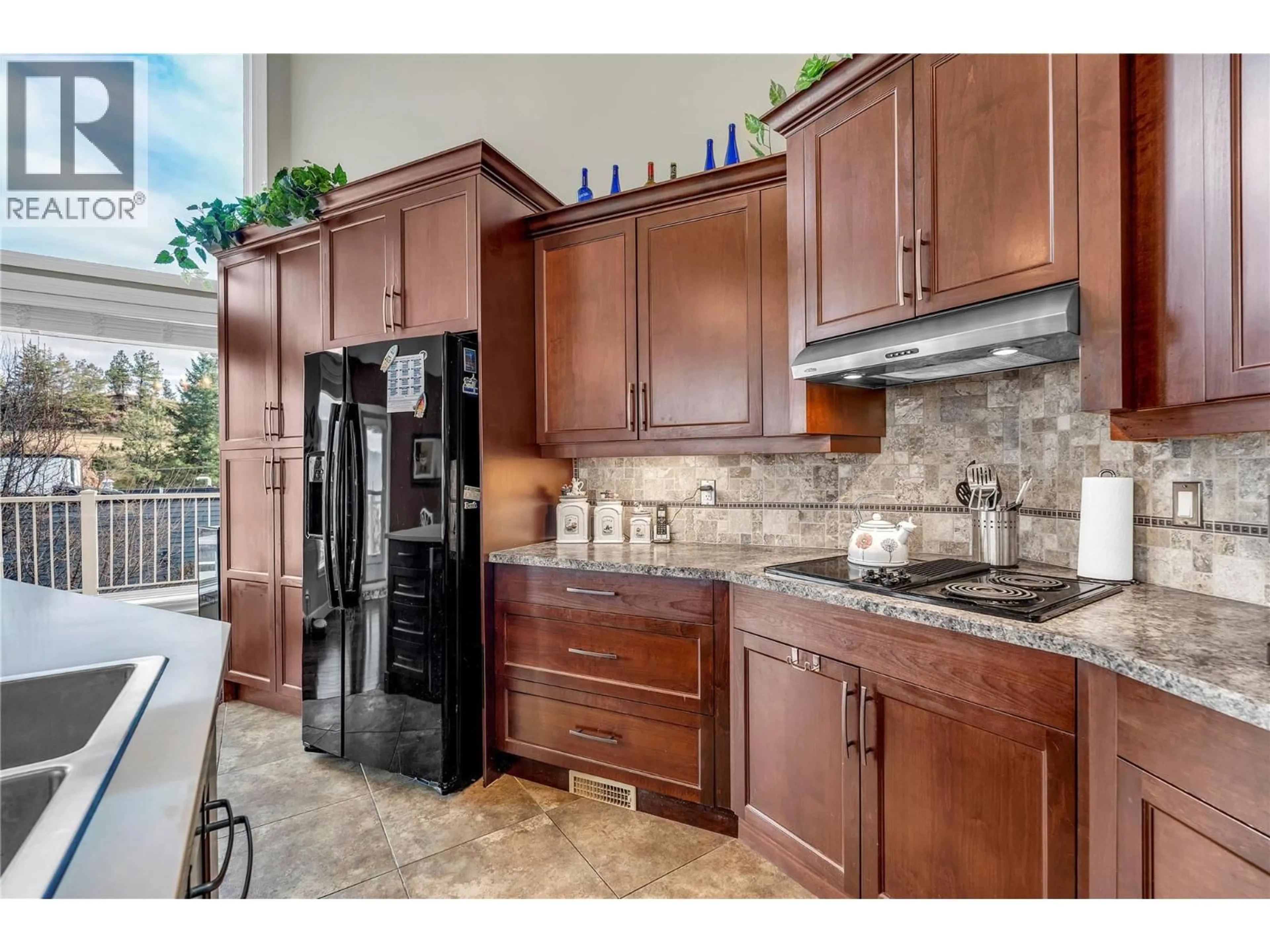 Open concept kitchen, ceramic/tile floor for 136 SUMAC RIDGE DRIVE, Summerland British Columbia V0H1Z6