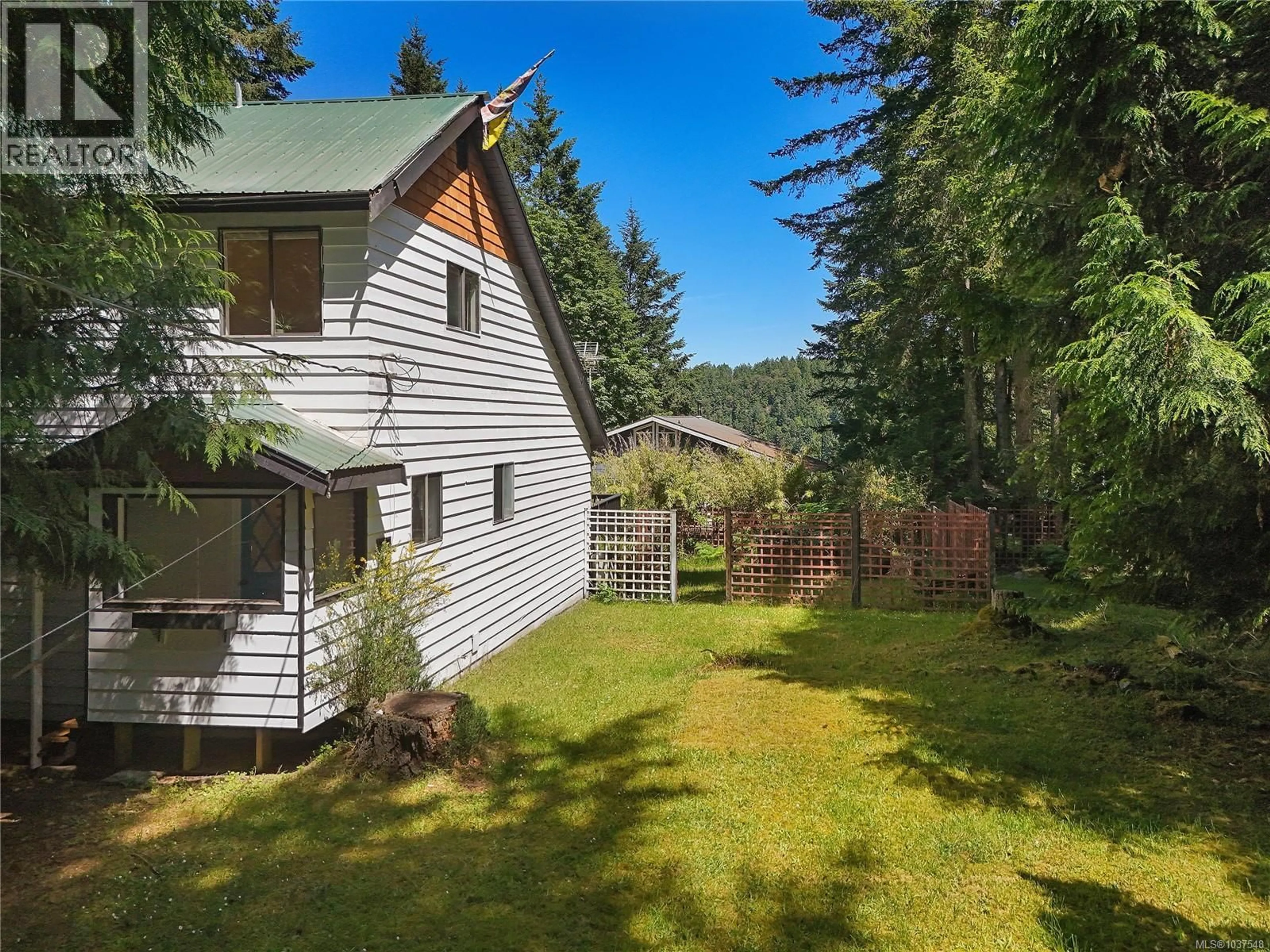 A pic from outside/outdoor area/front of a property/back of a property/a pic from drone, unknown for 177 SPINNAKER DRIVE, Mayne Island British Columbia V0N2J2
