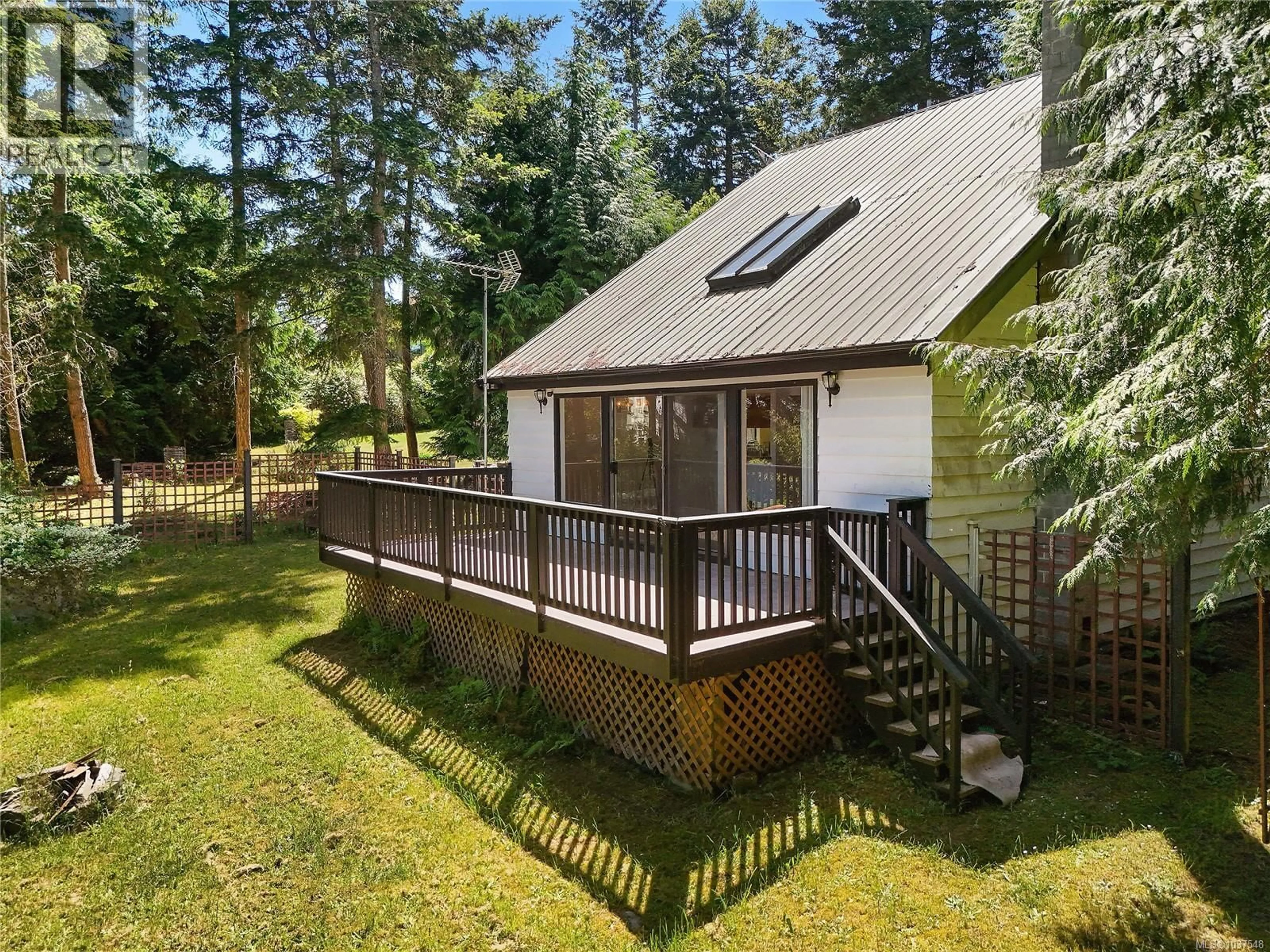 A pic from outside/outdoor area/front of a property/back of a property/a pic from drone, unknown for 177 SPINNAKER DRIVE, Mayne Island British Columbia V0N2J2