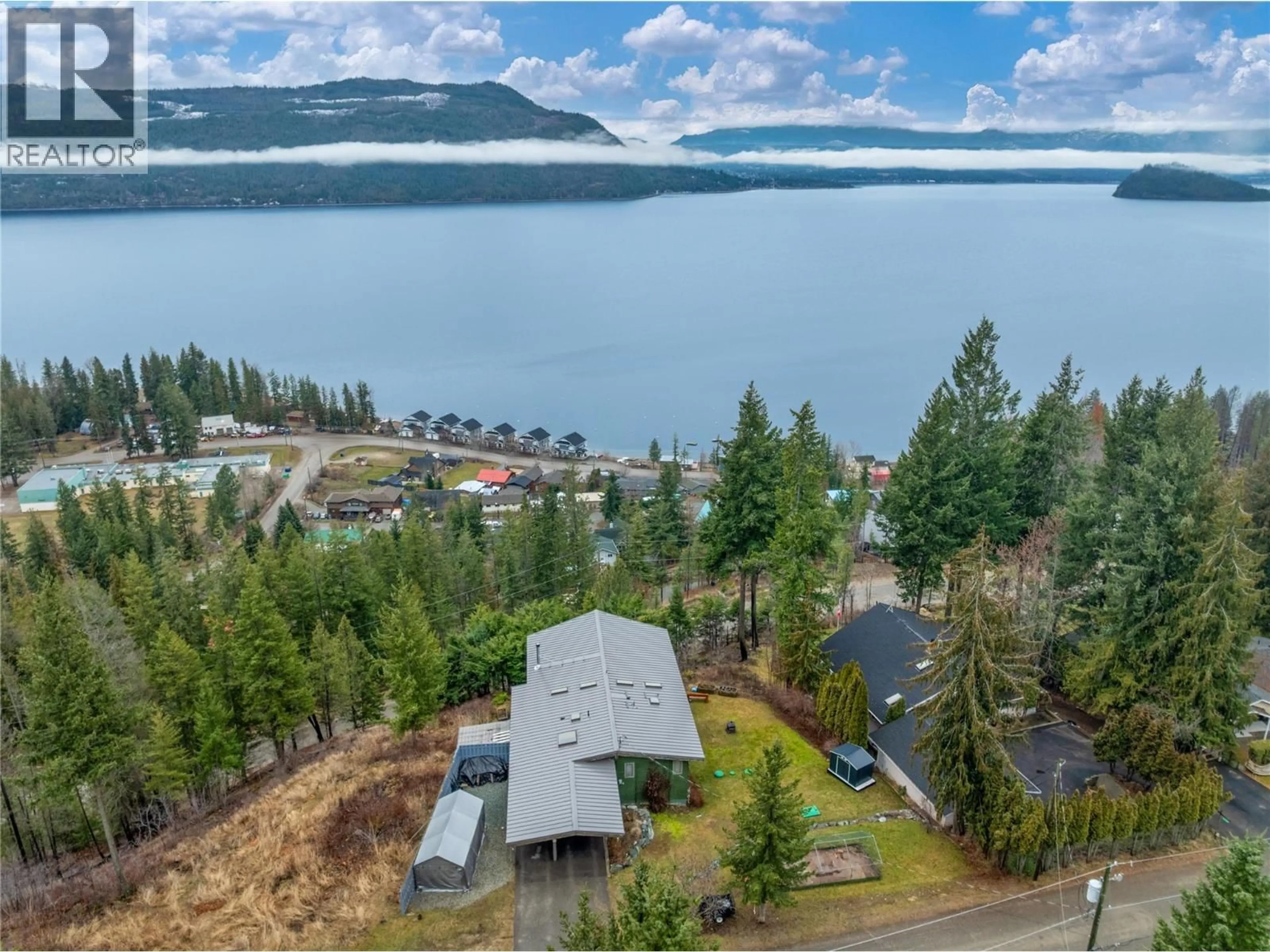 A pic from outside/outdoor area/front of a property/back of a property/a pic from drone, water/lake/river/ocean view for 5305 MEADOW CREEK CRESCENT, Celista British Columbia V0E1M6
