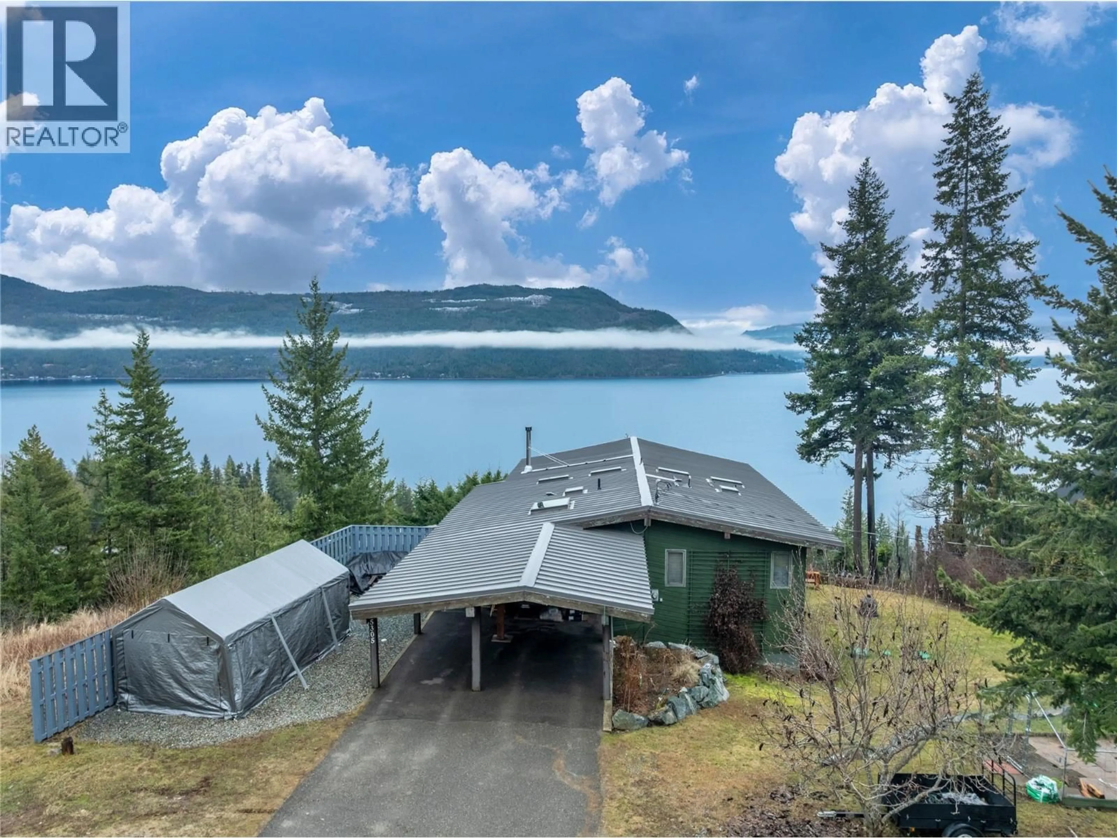 A pic from outside/outdoor area/front of a property/back of a property/a pic from drone, water/lake/river/ocean view for 5305 MEADOW CREEK CRESCENT, Celista British Columbia V0E1M6