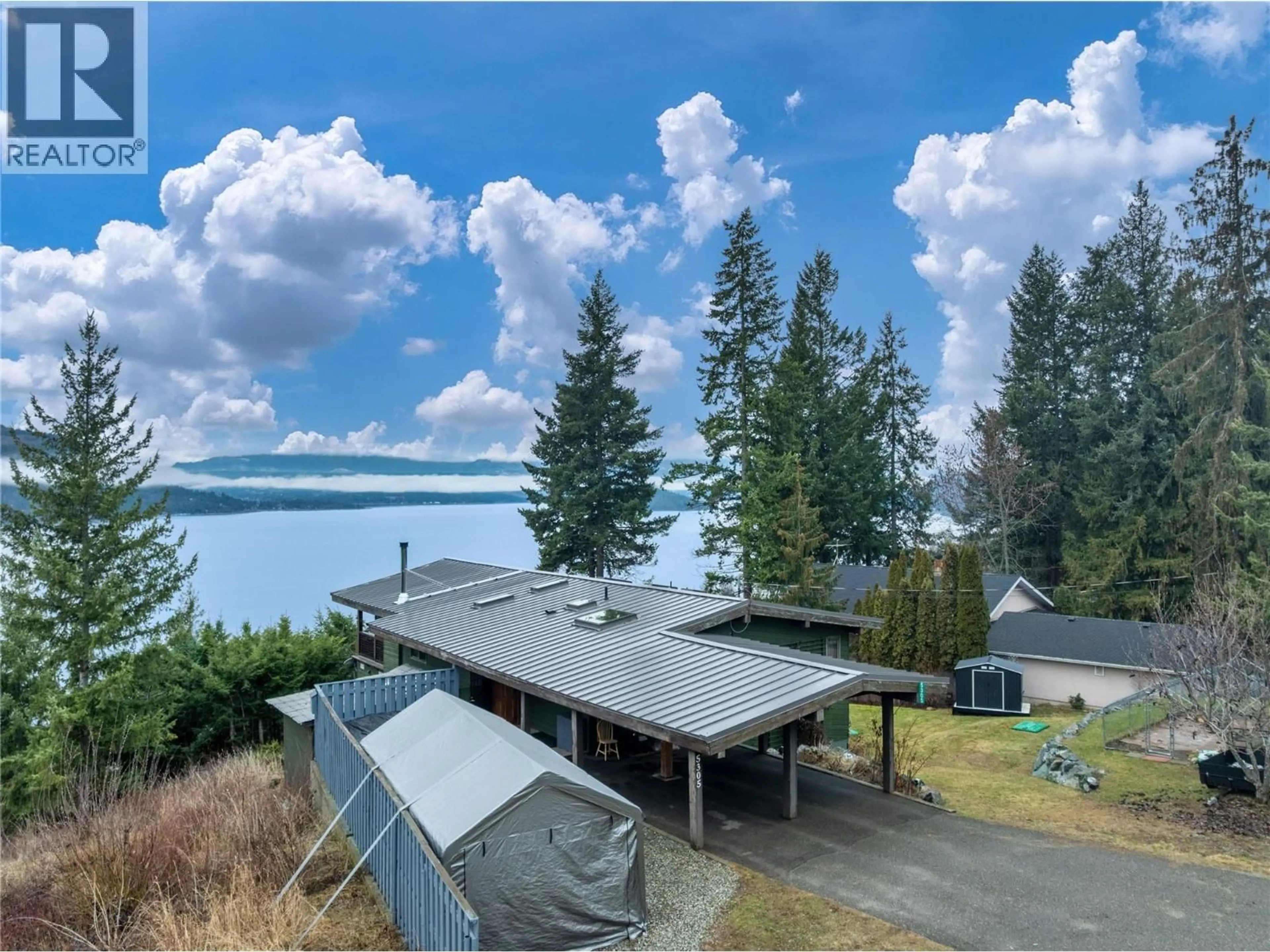 A pic from outside/outdoor area/front of a property/back of a property/a pic from drone, water/lake/river/ocean view for 5305 MEADOW CREEK CRESCENT, Celista British Columbia V0E1M6