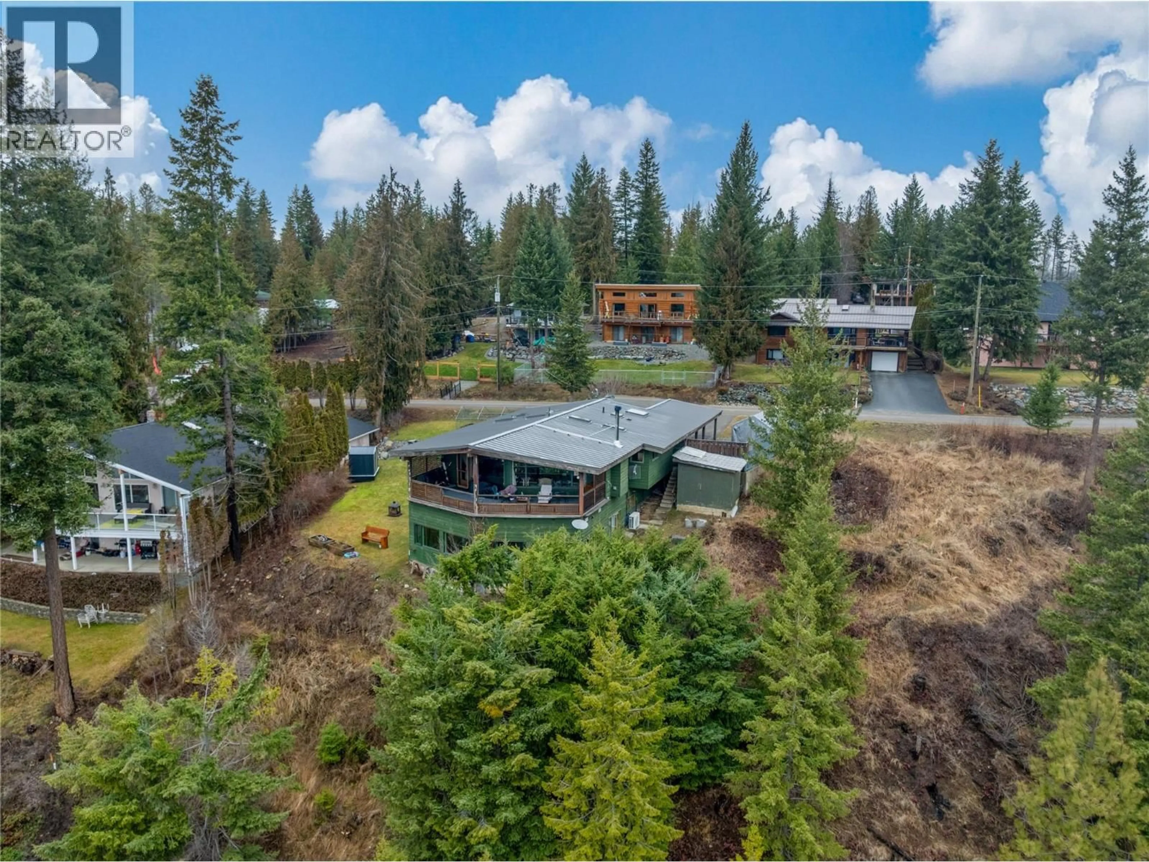 A pic from outside/outdoor area/front of a property/back of a property/a pic from drone, forest/trees view for 5305 MEADOW CREEK CRESCENT, Celista British Columbia V0E1M6