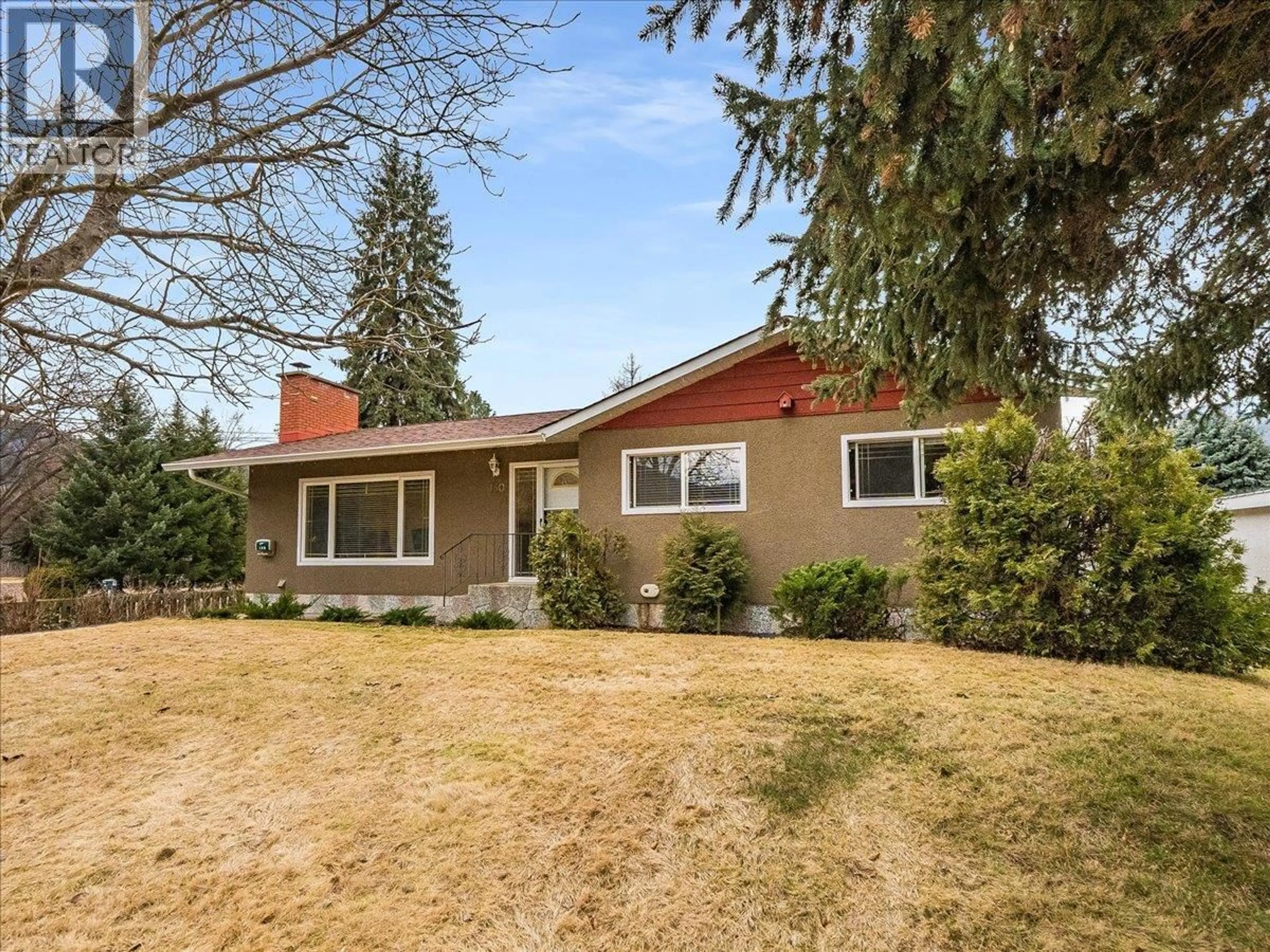 Home with vinyl exterior material, street for 130 100TH STREET, Castlegar British Columbia V1N3C5