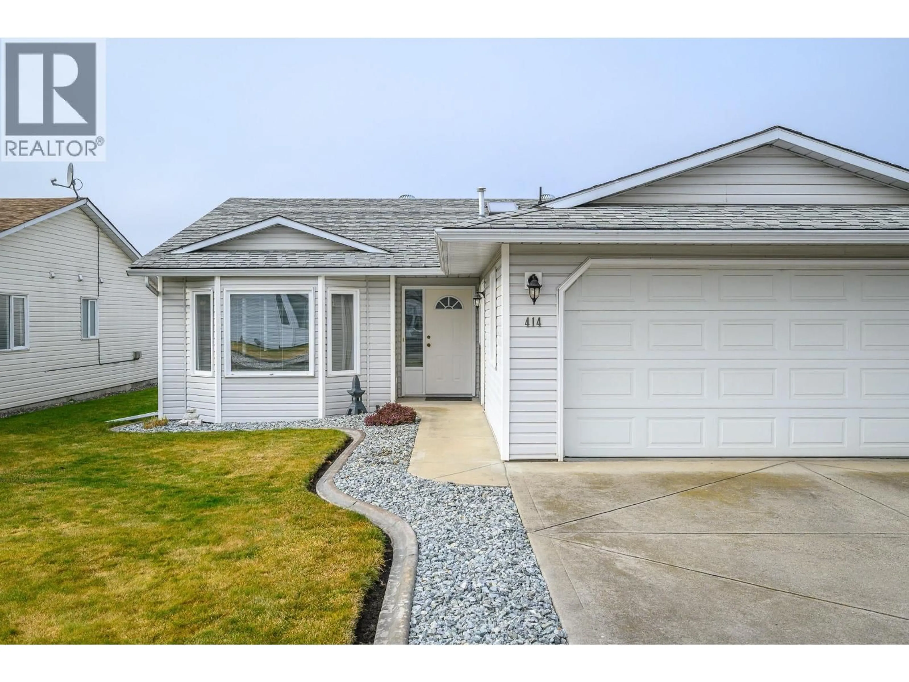 Home with vinyl exterior material, street for 414 4 STREET, Vernon British Columbia V1H1Z1
