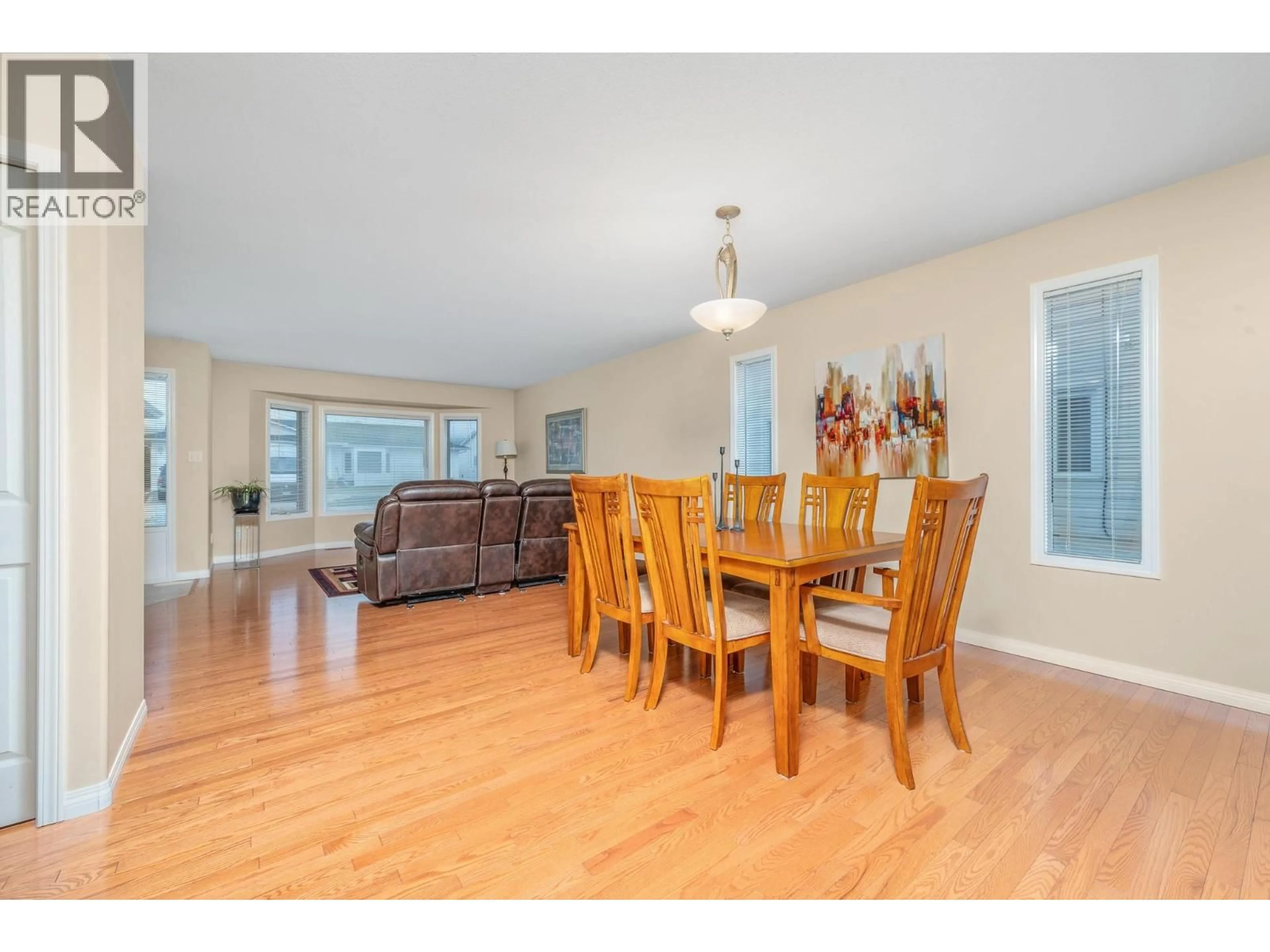 Dining room, wood/laminate floor for 414 4 STREET, Vernon British Columbia V1H1Z1